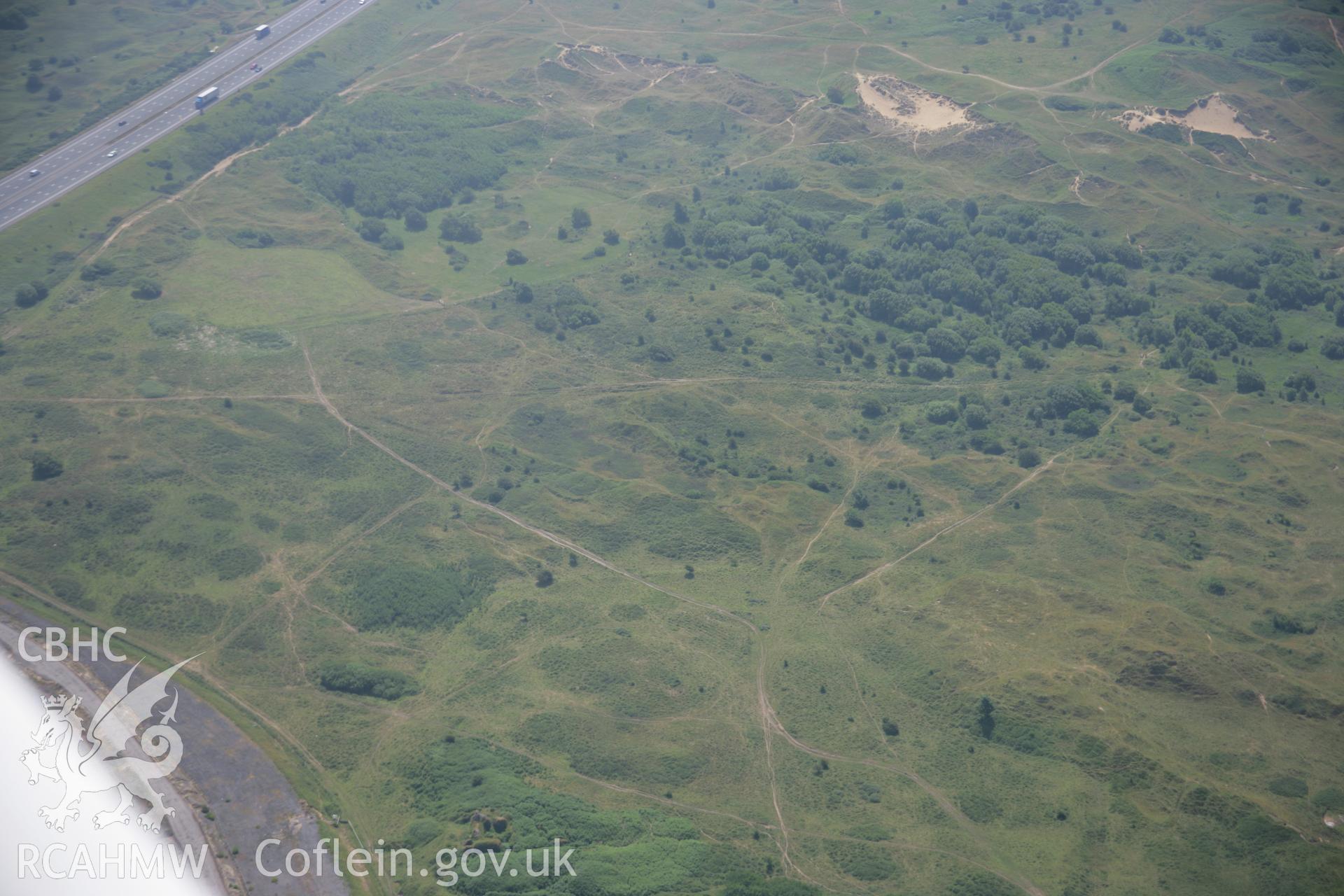 RCAHMW colour oblique photograph of Kenfig Medieval borough. Taken by Toby Driver on 29/06/2006.