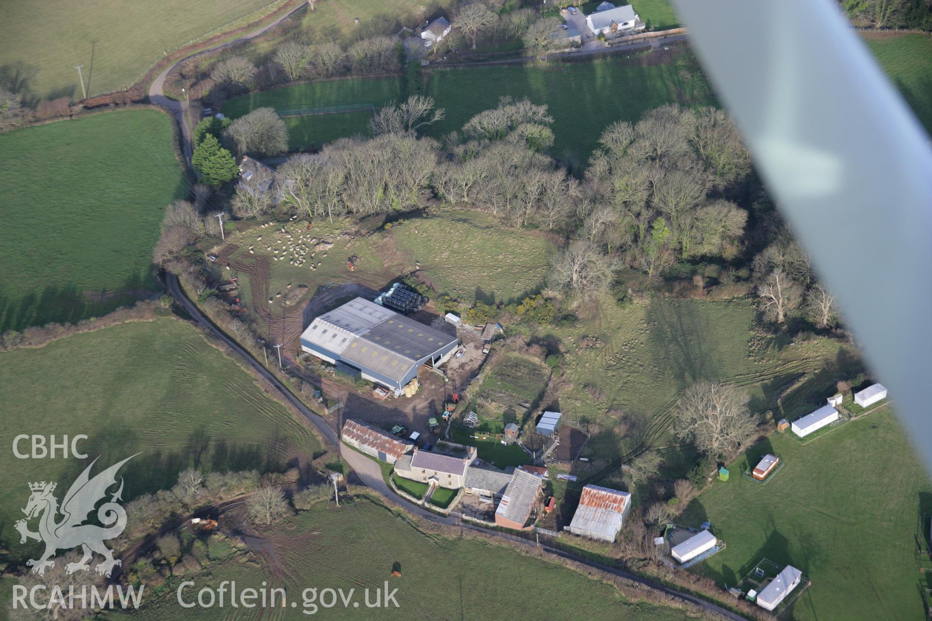 RCAHMW colour oblique aerial photograph of Norton Camp Hillfort, viewed from the south-west. Taken on 26 January 2006 by Toby Driver.