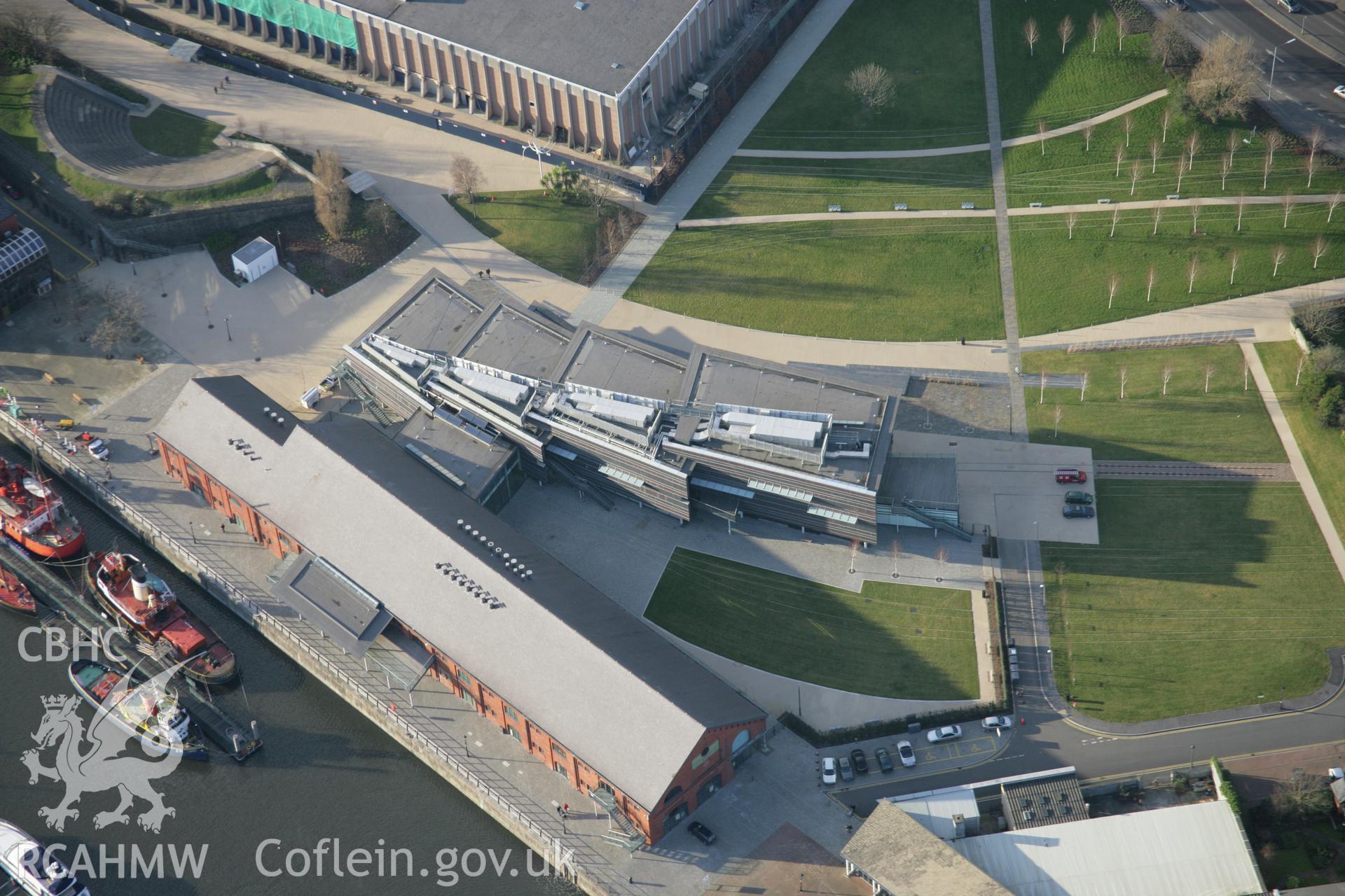 RCAHMW colour oblique aerial photograph of National Waterfront Museum, Swansea, viewed from the south-east. Taken on 26 January 2006 by Toby Driver.