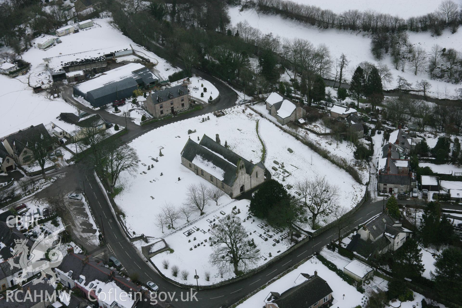 RCAHMW colour oblique aerial photograph of St Garmon's Church, Llanarmon Yn Ial, from the north-west. Taken on 06 March 2006 by Toby Driver.