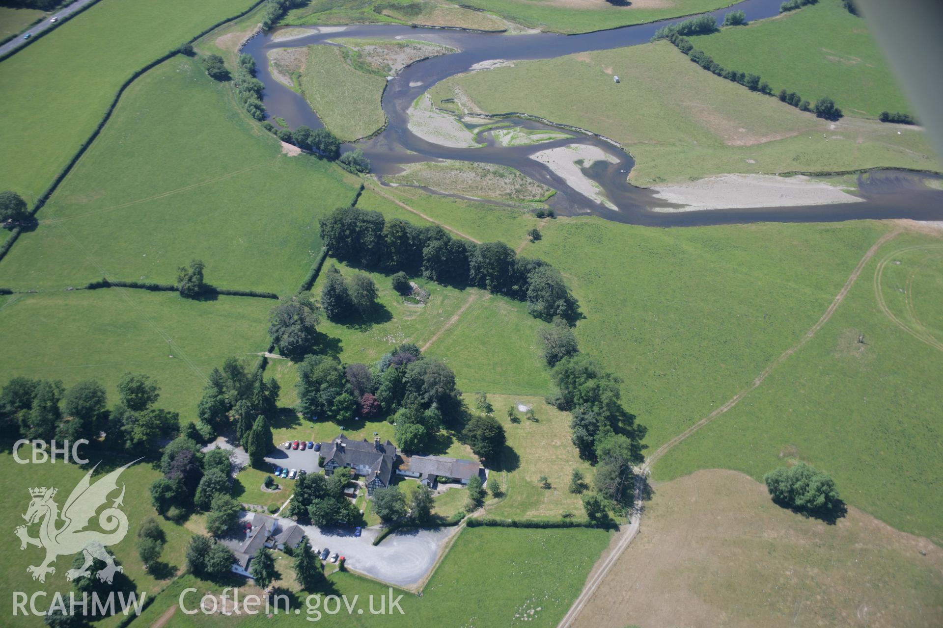 RCAHMW colour oblique aerial photograph of Roman road parchmarks, Maesmawr Hall. Taken on 17 July 2006 by Toby Driver.