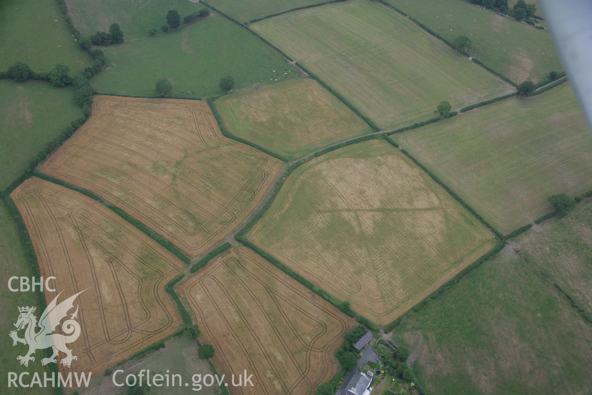 RCAHMW colour oblique aerial photograph of St Sulien's Church Enclosure. Taken on 21 July 2006 by Toby Driver.