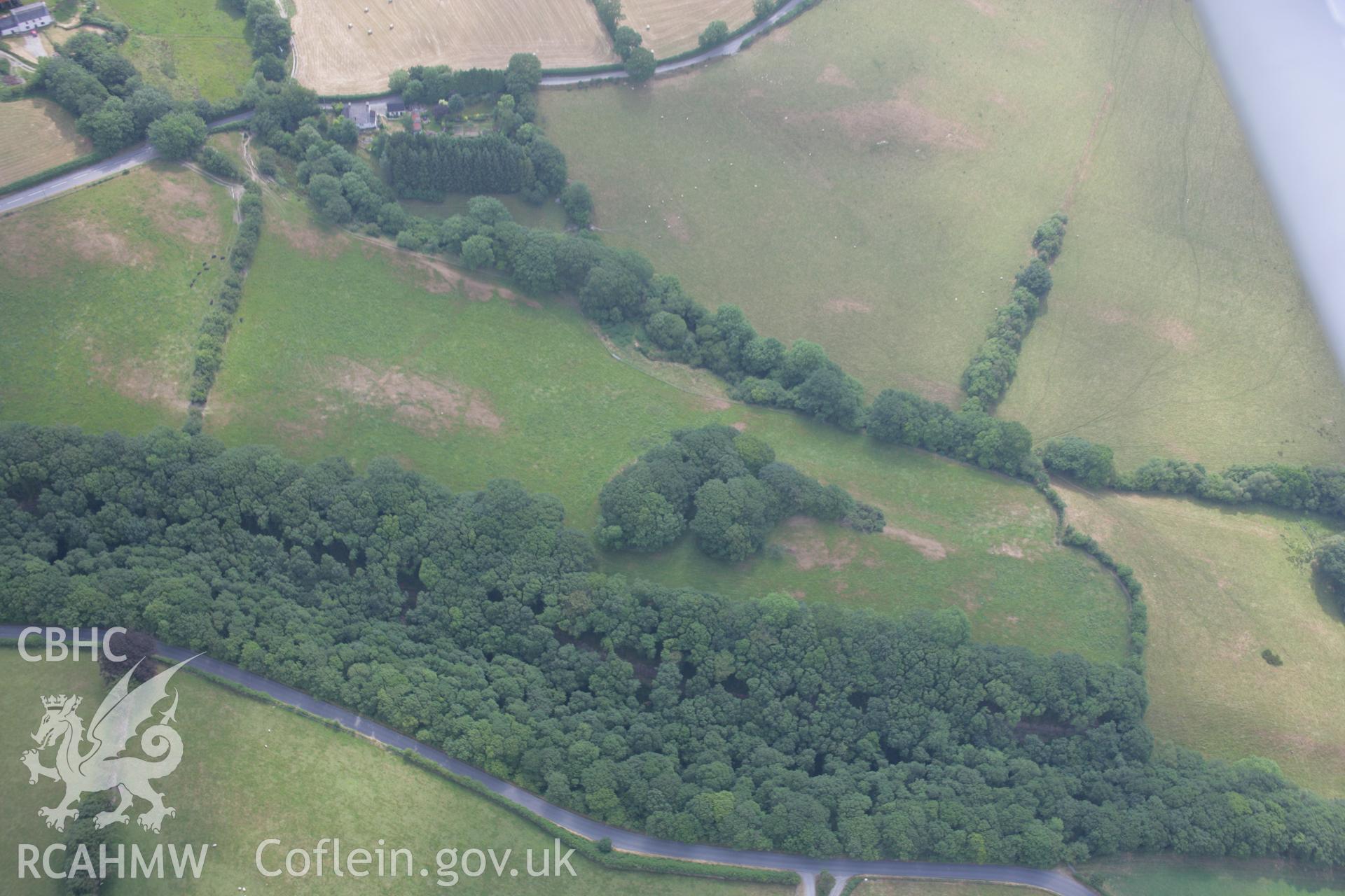 RCAHMW colour oblique aerial photograph of Tre-Coll Hillfort. Taken on 21 July 2006 by Toby Driver.