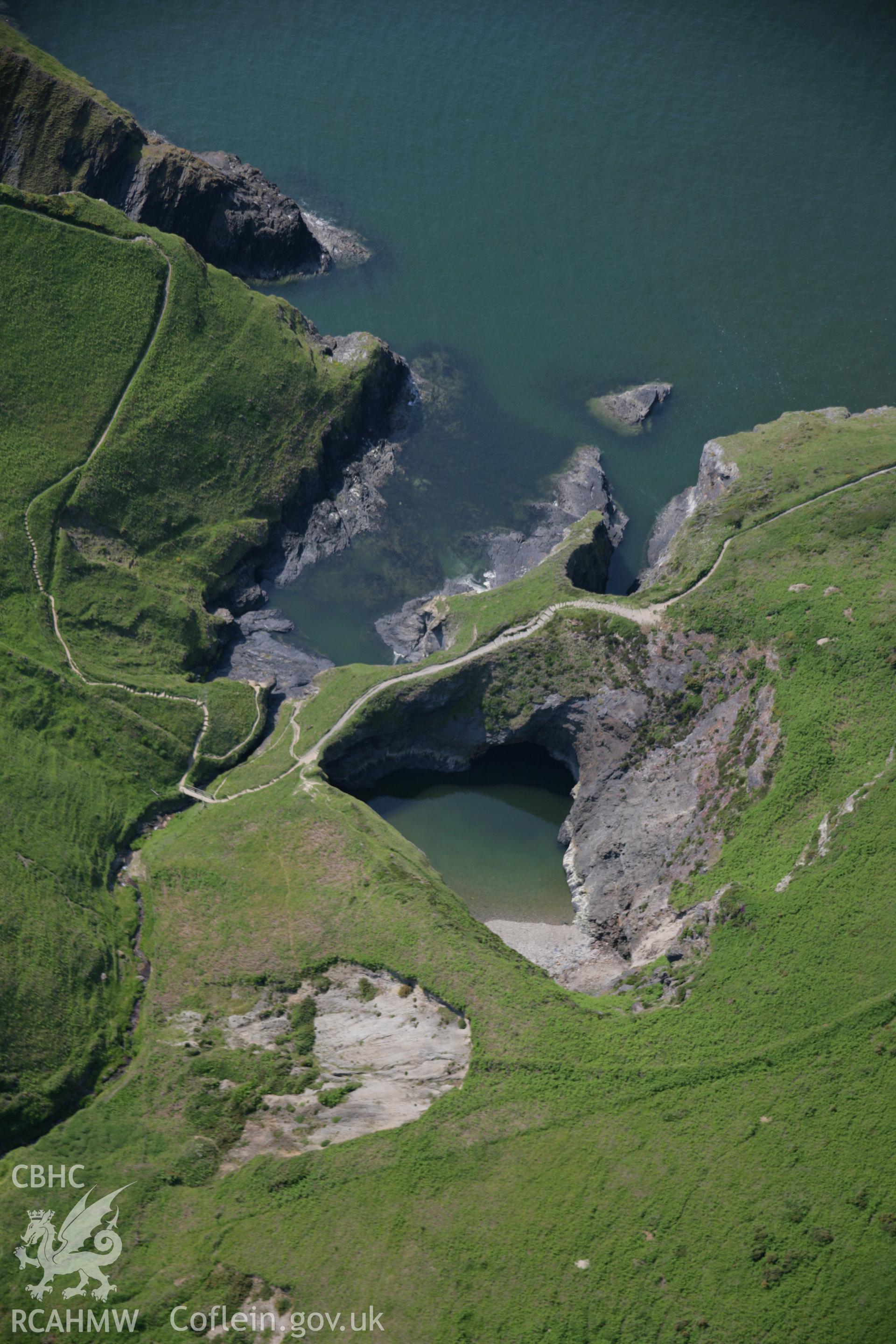 RCAHMW colour oblique aerial photograph of Traeth Bach, below Castell Treruffydd, from the south-east. Taken on 08 June 2006 by Toby Driver.