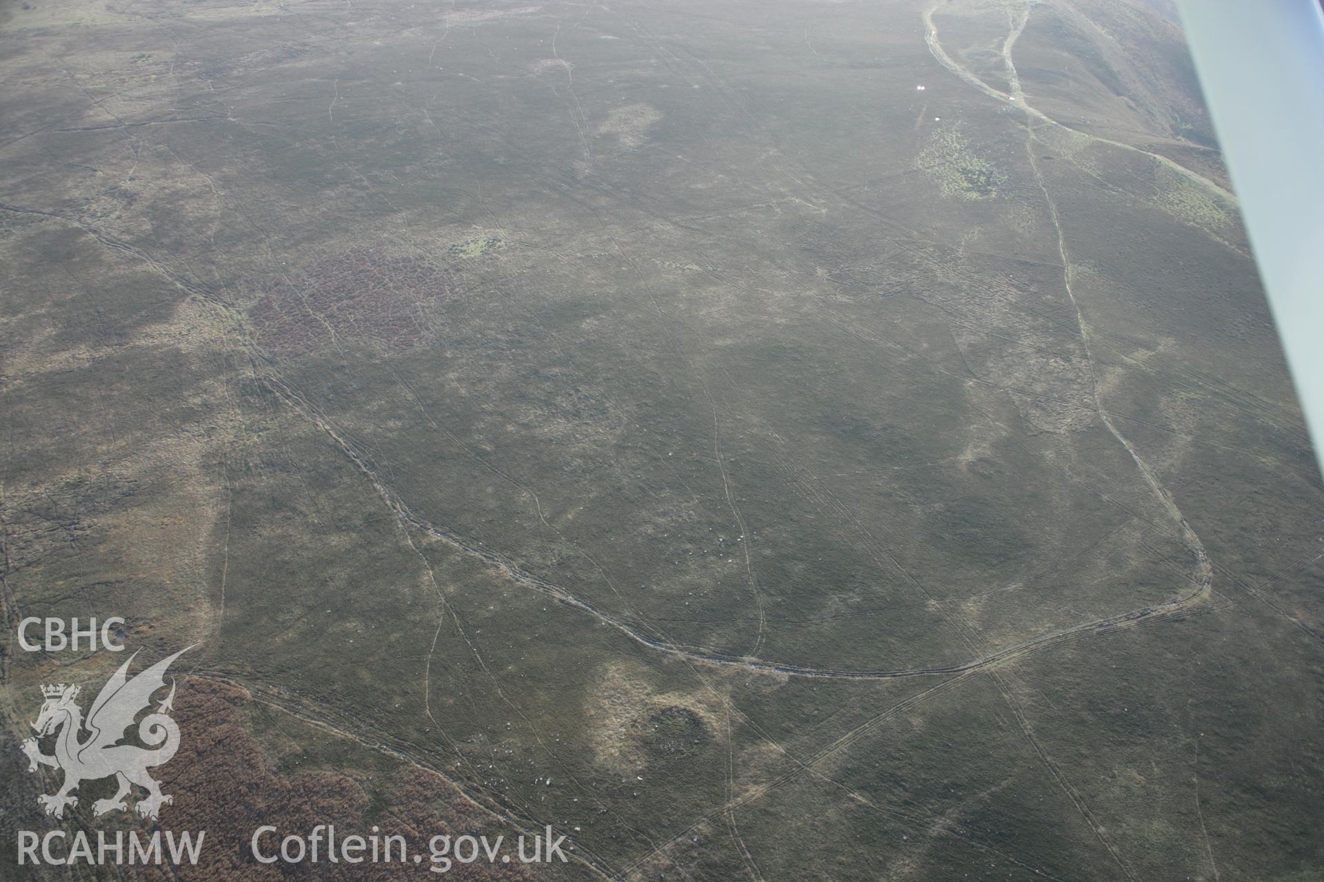 RCAHMW colour oblique aerial photograph of Rhossili Down Ring Cairn from the north. Taken on 26 January 2006 by Toby Driver.