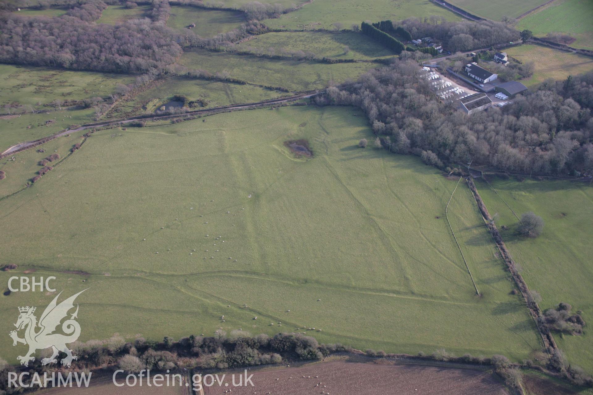 RCAHMW colour oblique aerial photograph of Stout Hall Earthworks from the north-west. Taken on 26 January 2006 by Toby Driver.