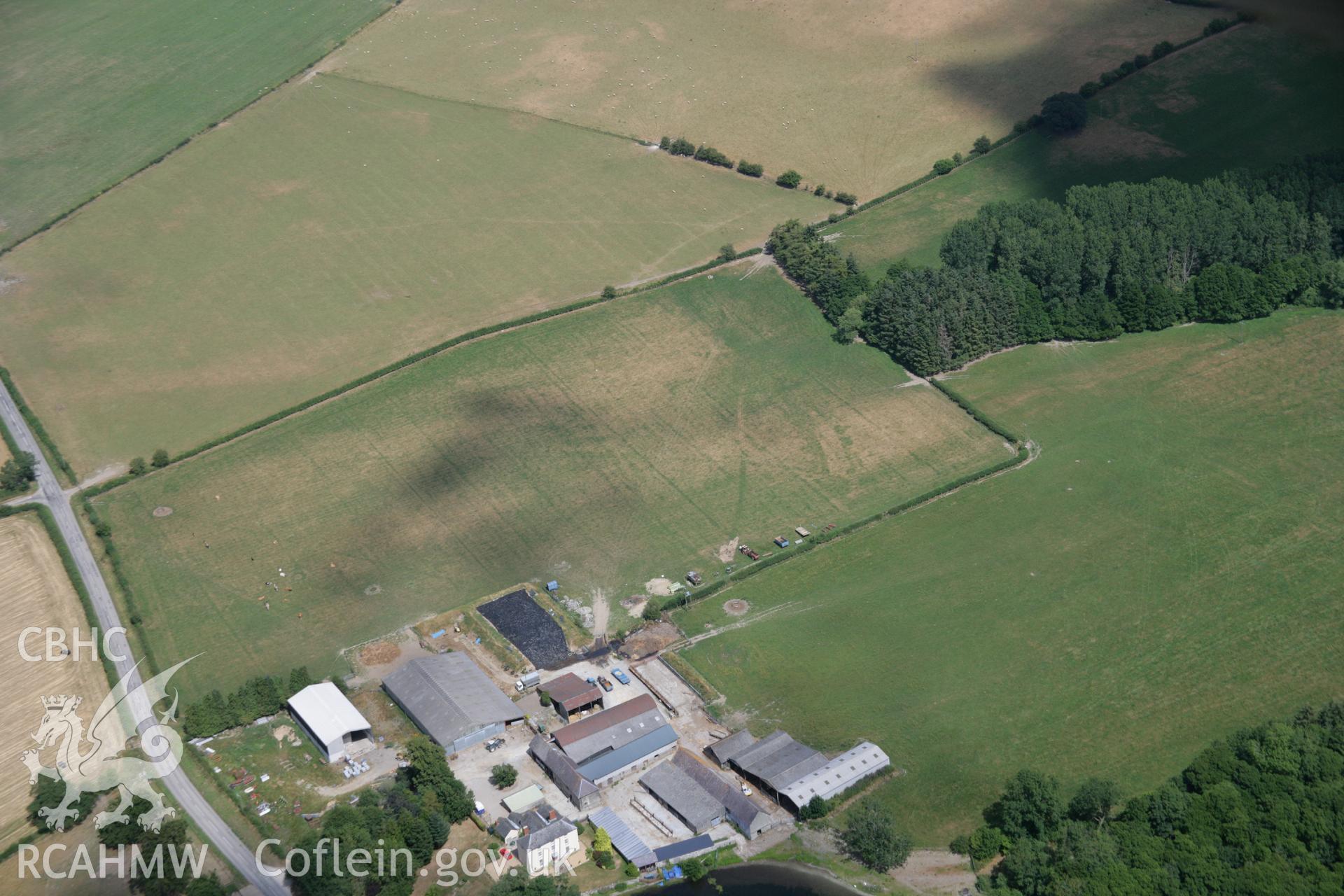 RCAHMW colour oblique aerial photograph of Hindwell Farm Roman Fort. Taken on 27 July 2006 by Toby Driver.