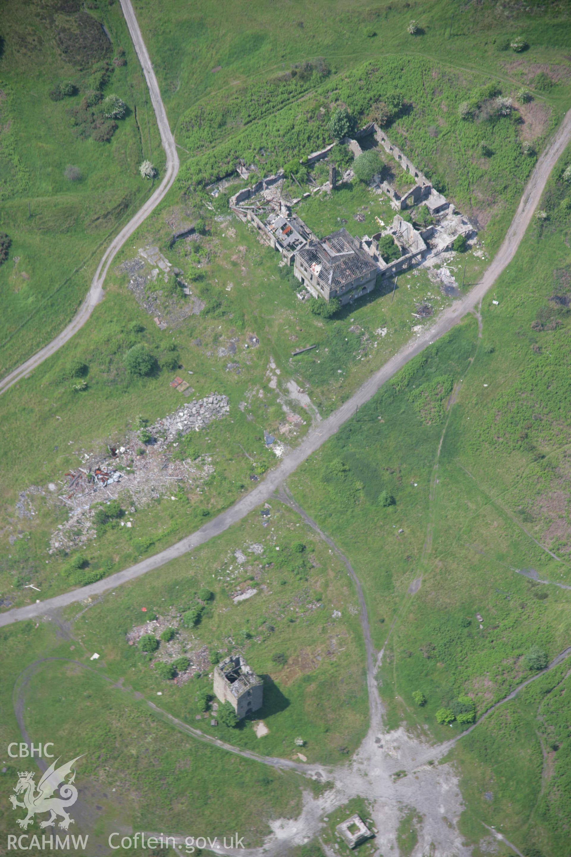 RCAHMW colour oblique aerial photograph of British Ironworks Colliery Pumping Engine House viewed from the east. Taken on 09 June 2006 by Toby Driver.