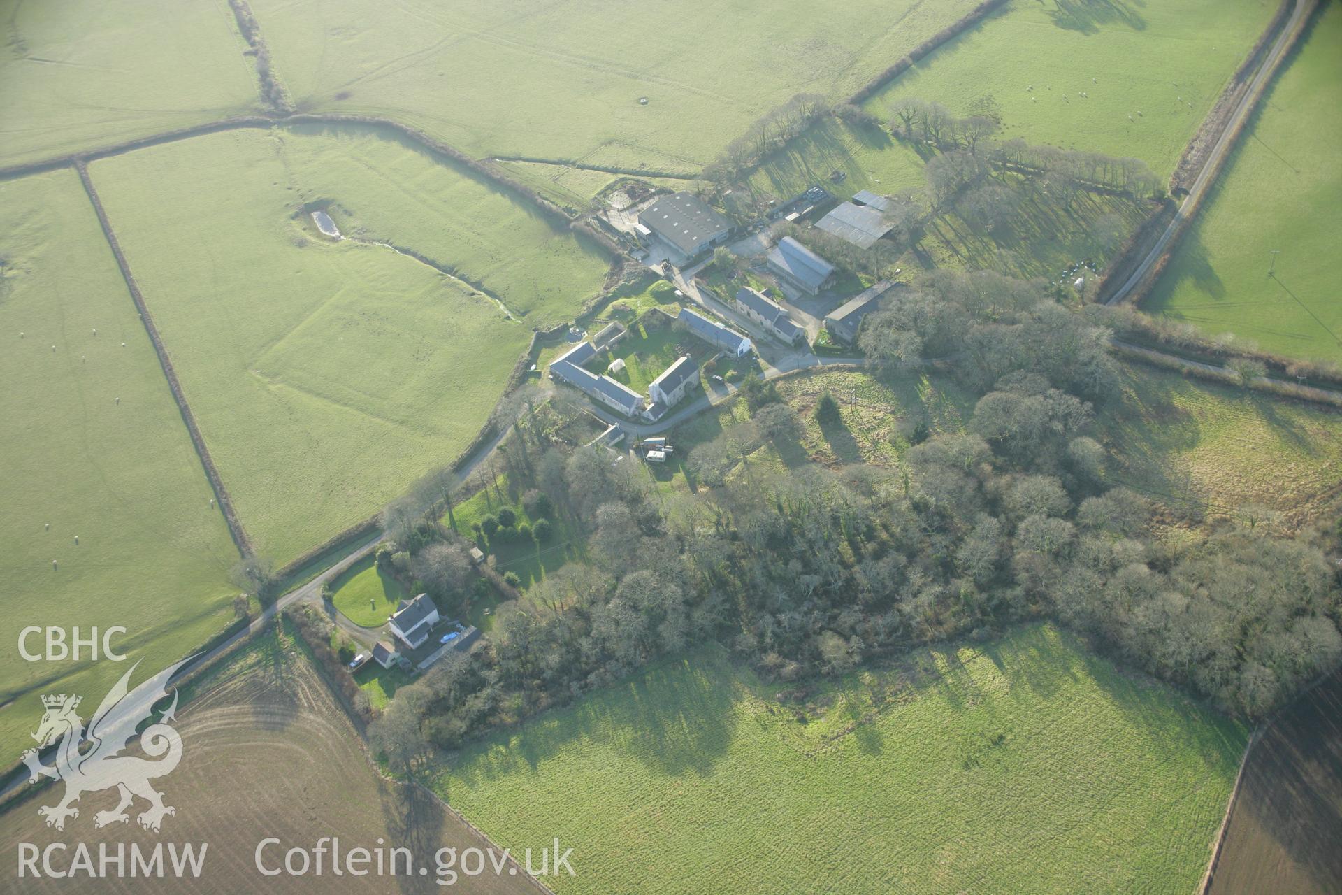 RCAHMW colour oblique aerial photograph of Coedcanlas Garden Earthworks, Martletwy, from the north-east. Taken on 26 January 2006 by Toby Driver.