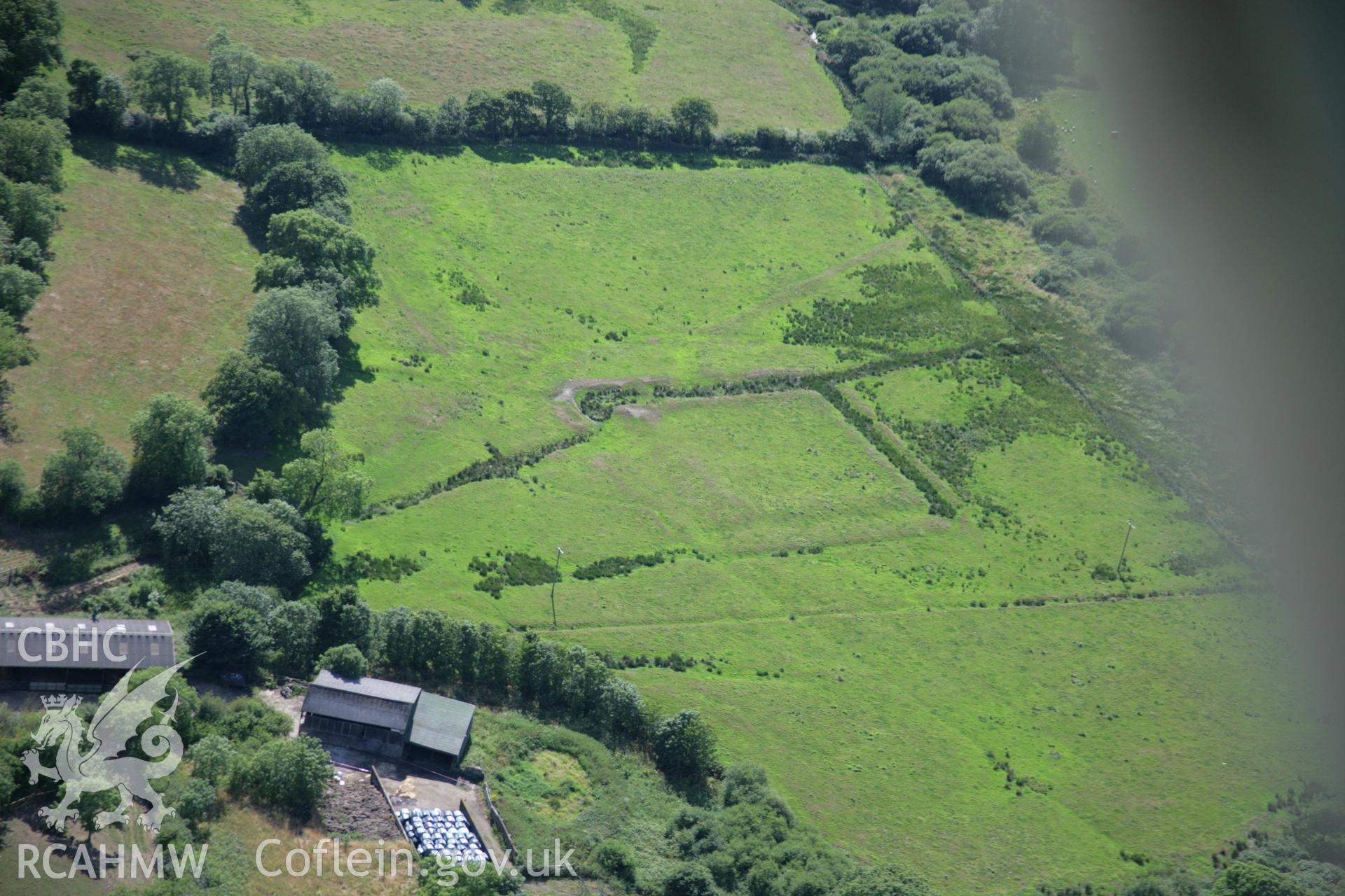 RCAHMW colour oblique aerial photograph of Merryborough Moated Site. Taken on 24 July 2006 by Toby Driver.