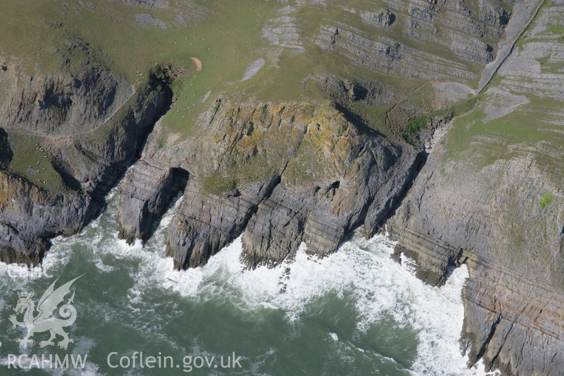 RCAHMW colour oblique aerial photograph of Goat's Hole Cave, Paviland. Taken on 11 July 2006 by Toby Driver.