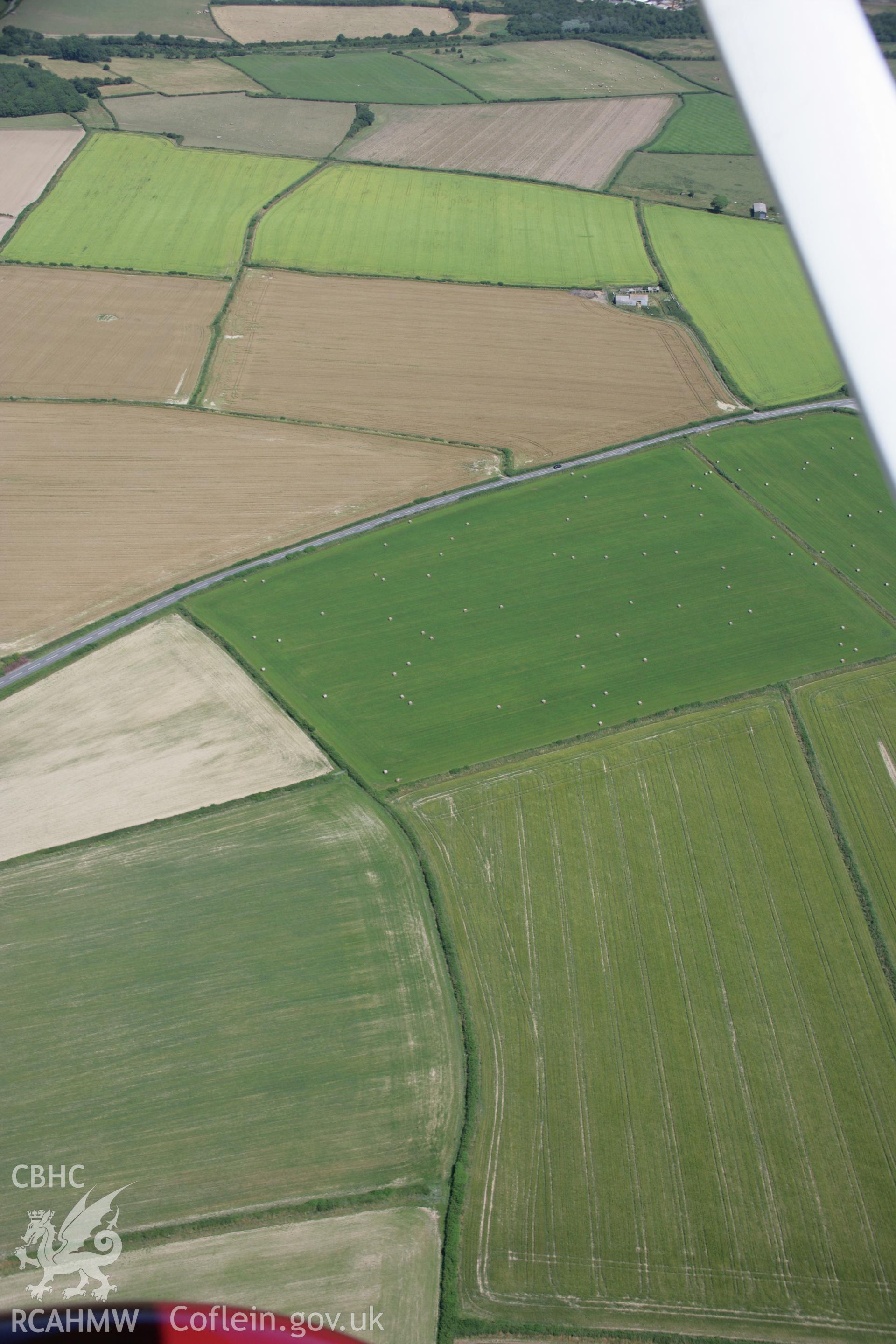 RCAHMW colour oblique aerial photograph of Monkton East Barrow III. Taken on 24 July 2006 by Toby Driver.