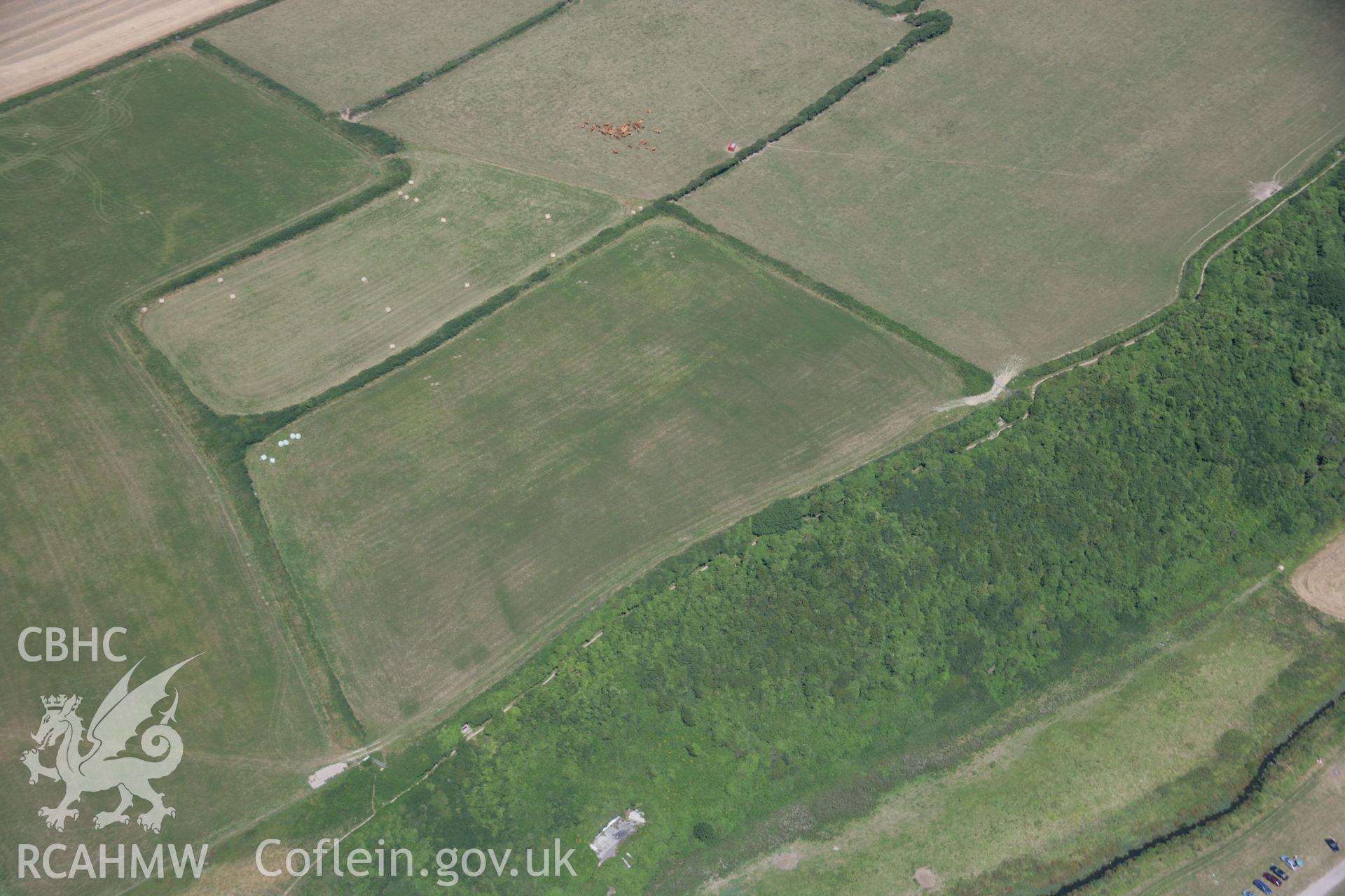 RCAHMW colour oblique aerial photograph of enclosure, Cwm Col-huw. Taken on 24 July 2006 by Toby Driver