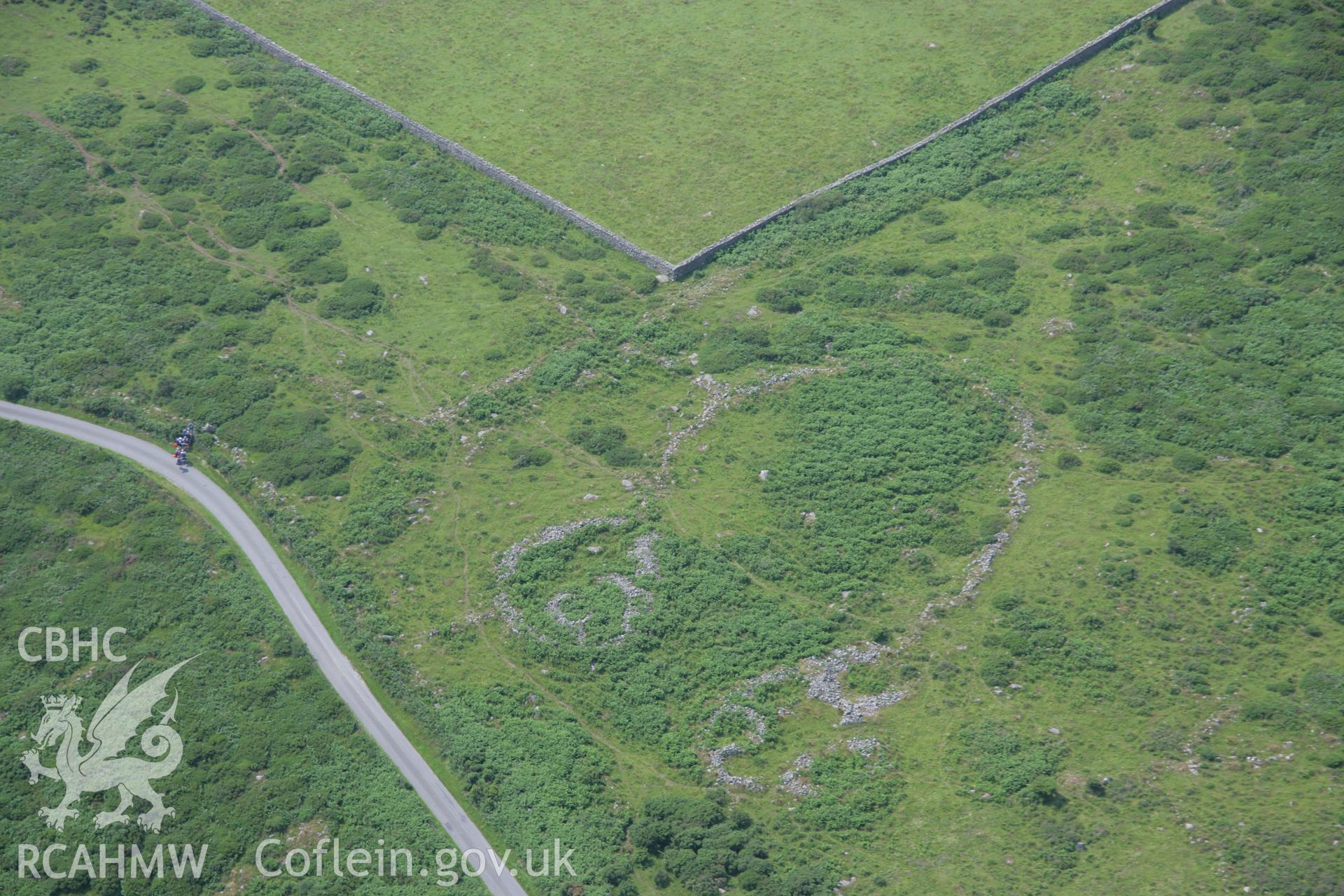 RCAHMW colour oblique aerial photograph of Muriau'r Gwyddelod Ancient Village. Taken on 04 July 2006 by Toby Driver.