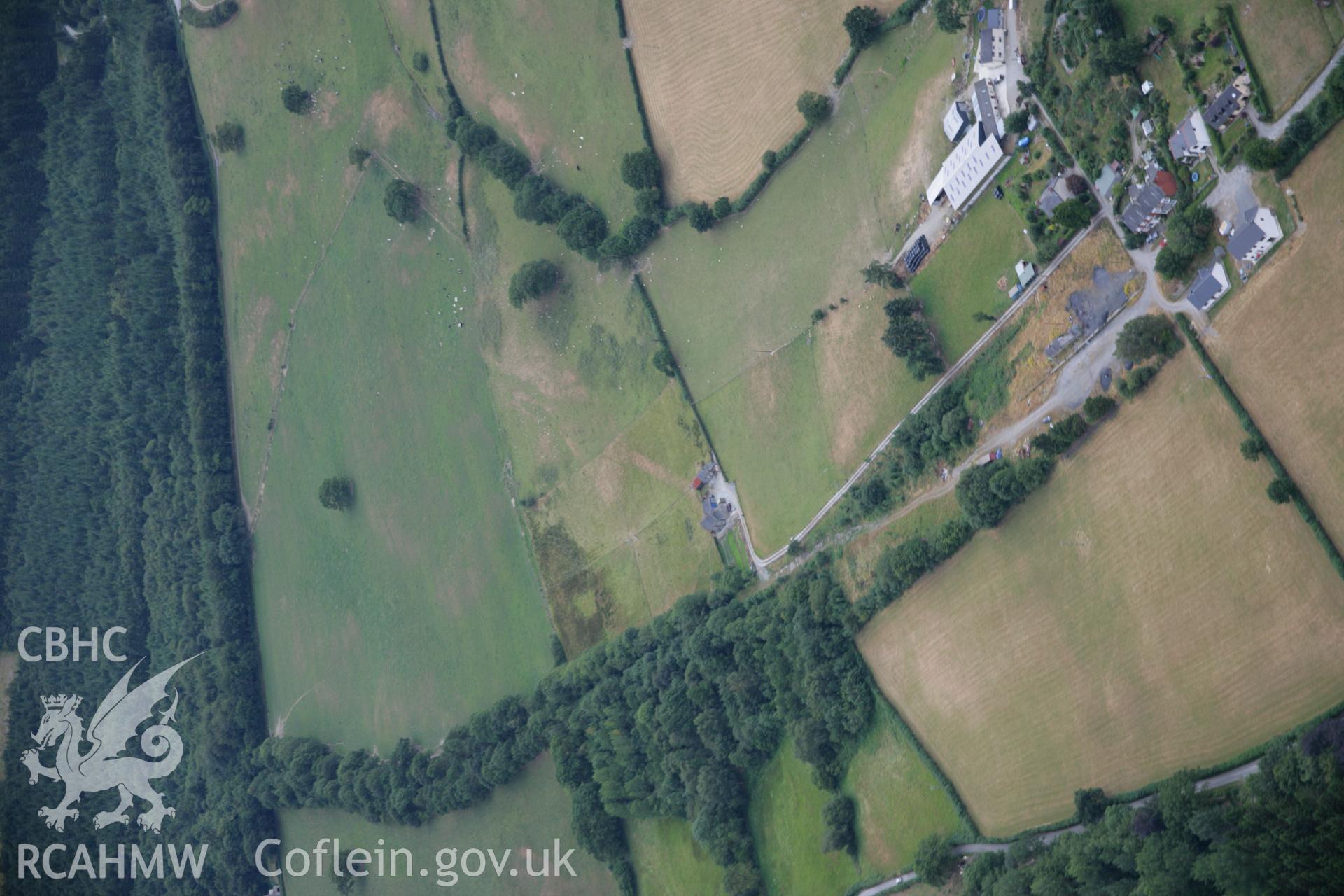 RCAHMW colour oblique aerial photograph of Sarn Helen at Hendre Villa. Taken on 27 July 2006 by Toby Driver.