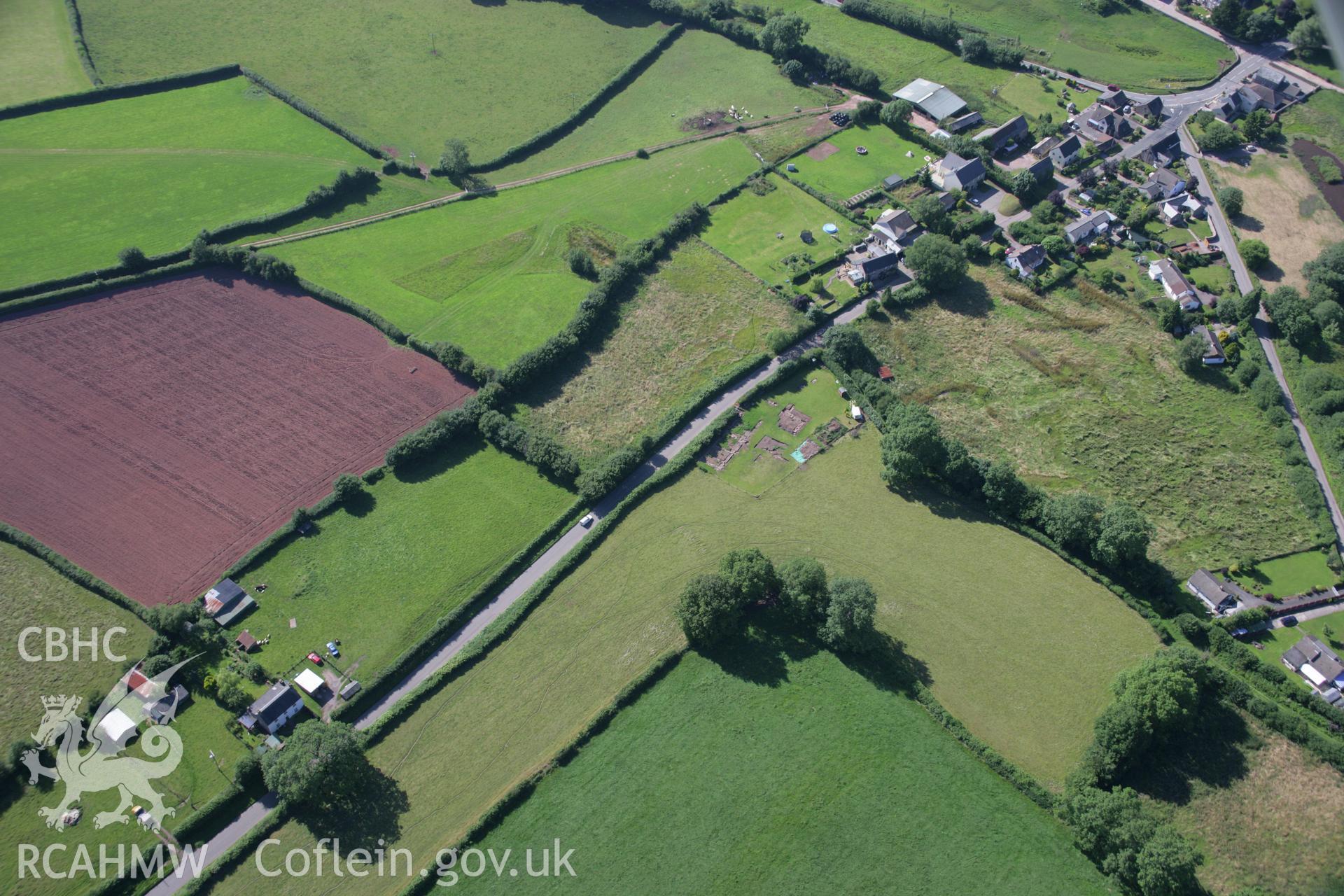 RCAHMW colour oblique aerial photograph of Trelech Village Earthworks. Taken on 13 July 2006 by Toby Driver.