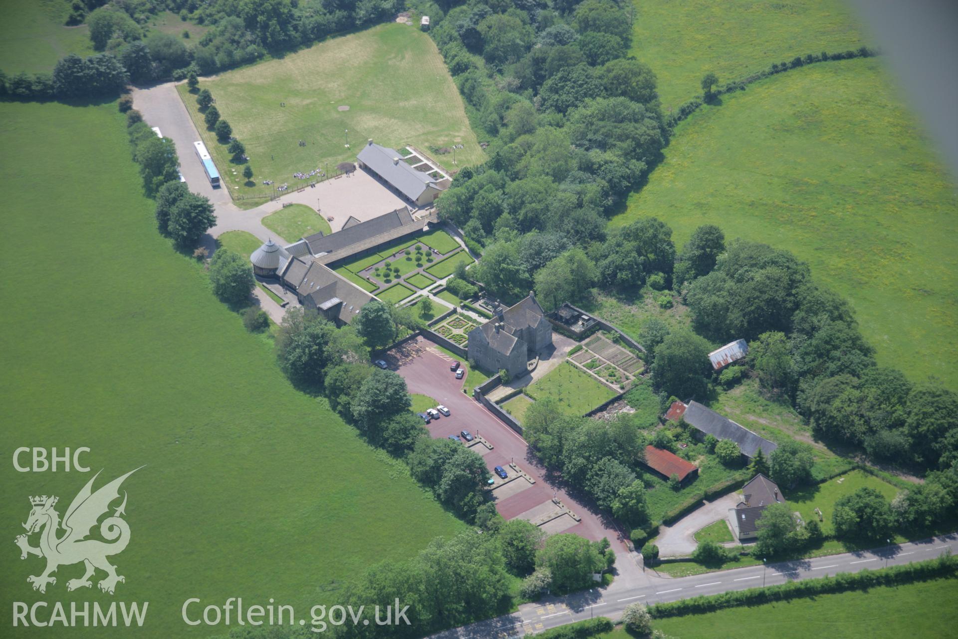 RCAHMW colour oblique aerial photograph of Llancaiach Fawr house, viewed from the north-east. Taken on 09 June 2006 by Toby Driver.