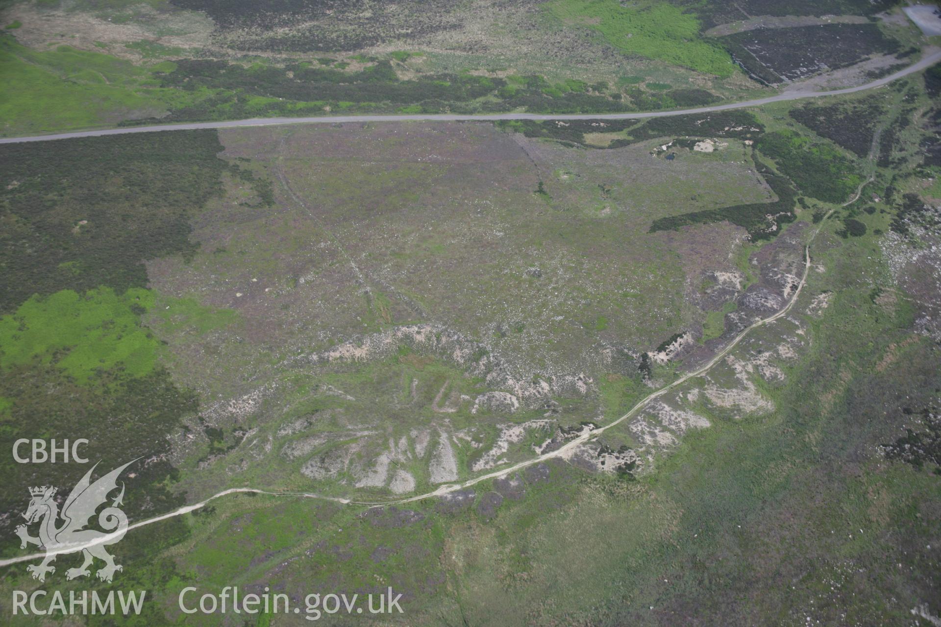 RCAHMW colour oblique aerial photograph of Nant Llechan Ironstone Workings, viewed from the south. Taken on 09 June 2006 by Toby Driver.