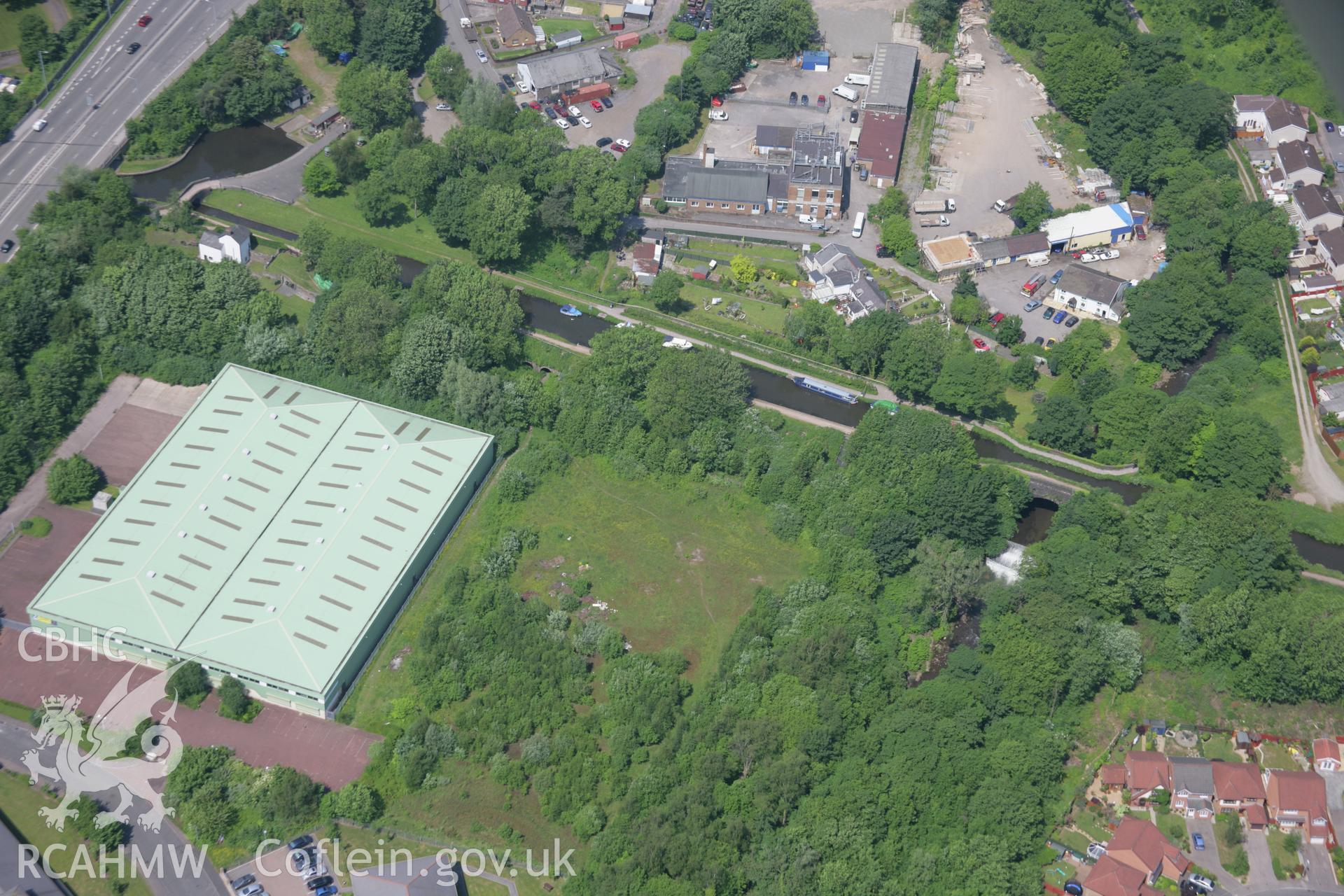 RCAHMW colour oblique aerial photograph of Monmouthshire Canal, Pantymoile, viewed from the south-east. Taken on 09 June 2006 by Toby Driver.