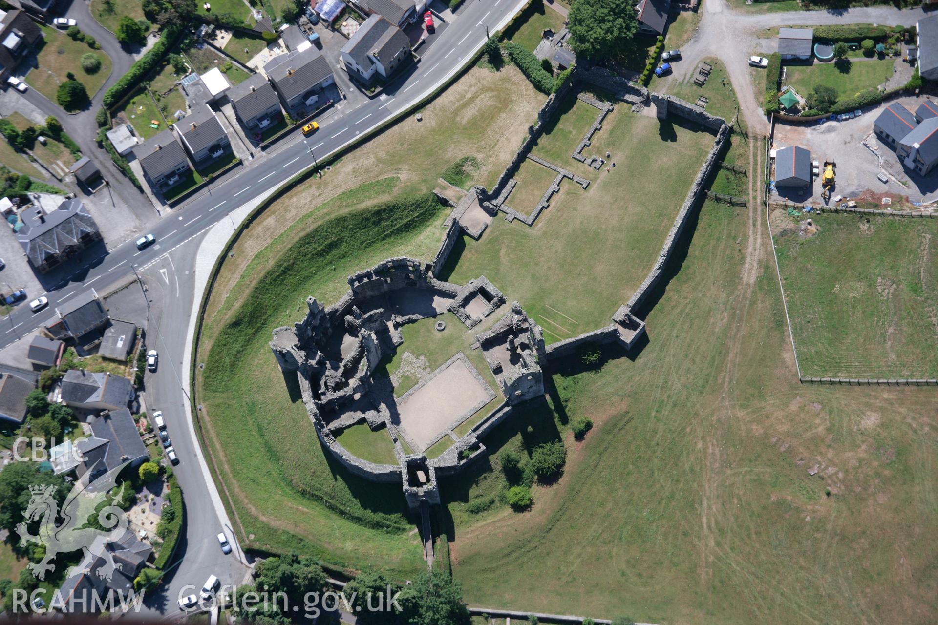 RCAHMW colour oblique aerial photograph of Coity Castle. Taken on 24 July 2006 by Toby Driver.