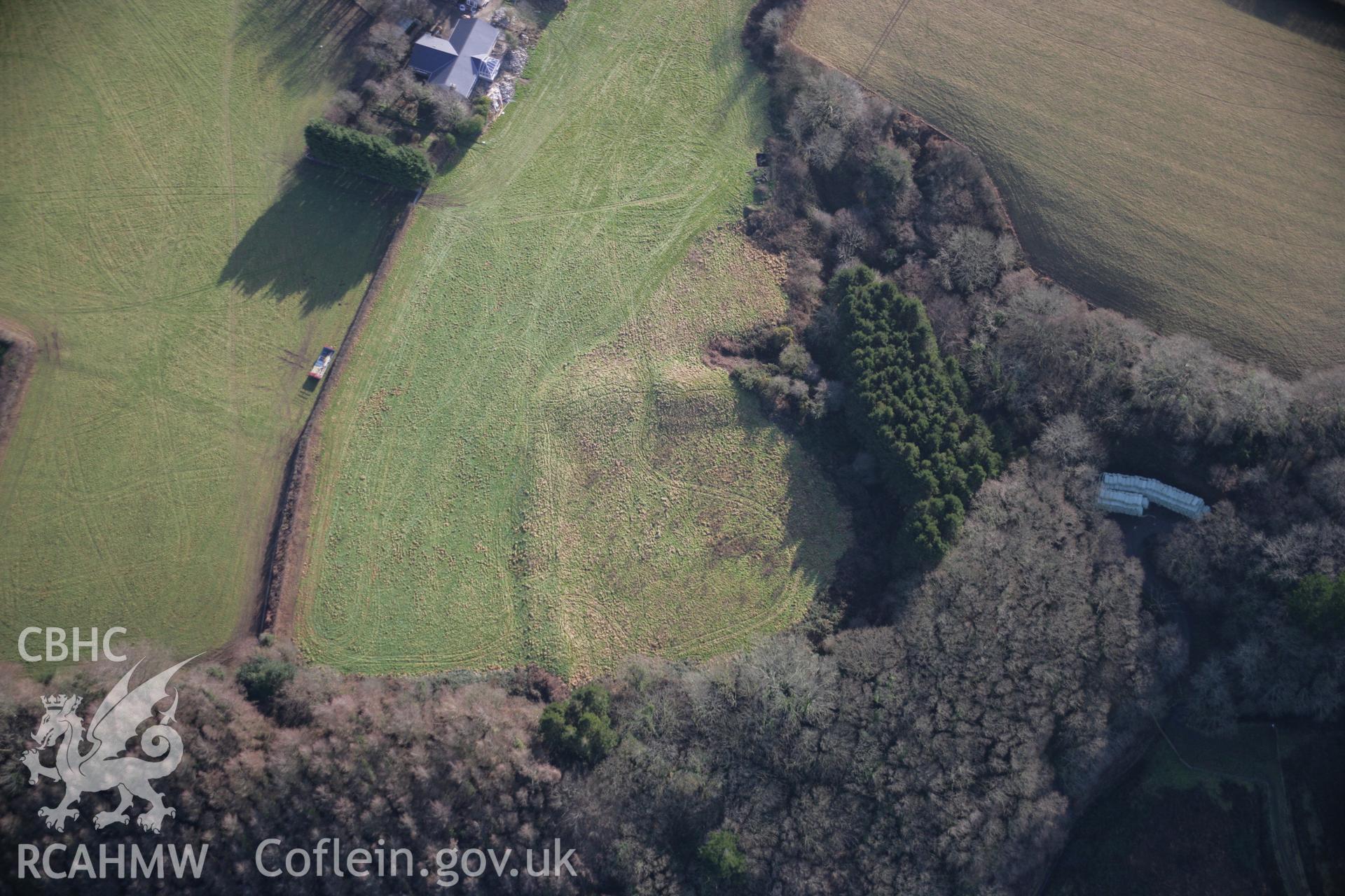 RCAHMW colour oblique aerial photograph of Bush Inn Enclosure, Robeston Wathen from the north. Taken on 11 January 2006 by Toby Driver.