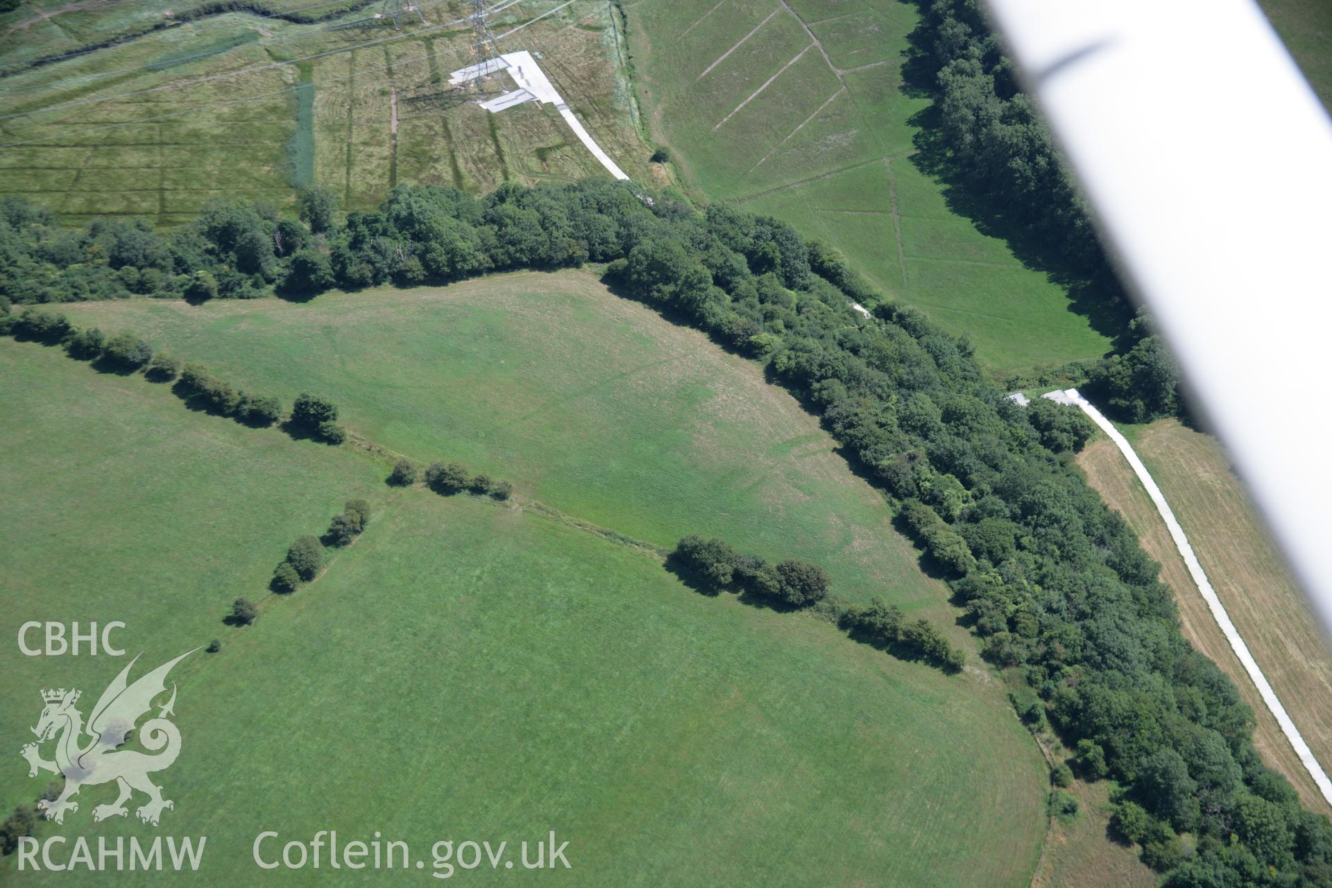 RCAHMW colour oblique aerial photograph of Rills Valley Enclosure. Taken on 24 July 2006 by Toby Driver.