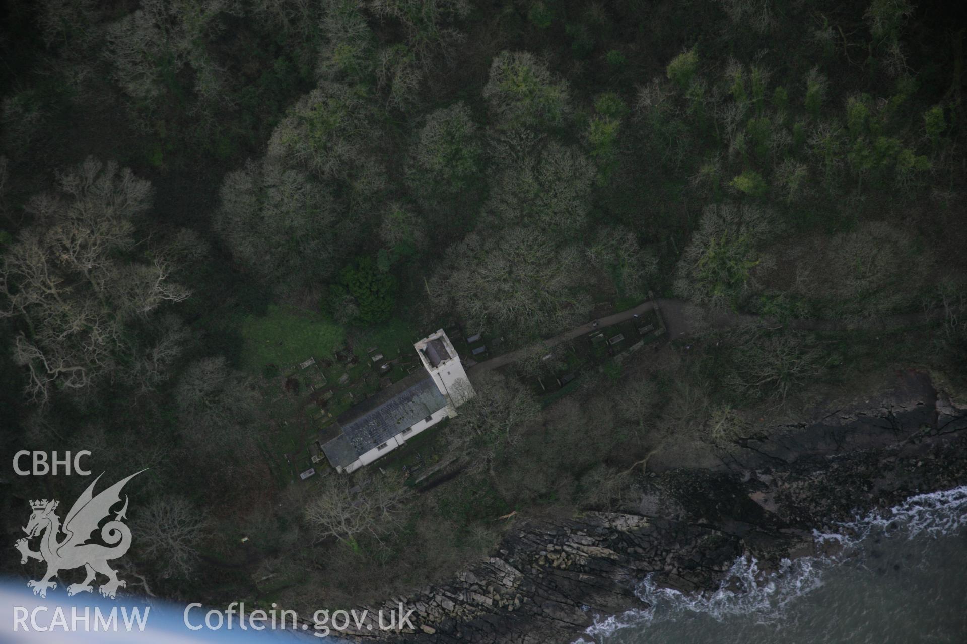 RCAHMW colour oblique aerial photograph of St Illtyd's Church, Oxwich, from the north. Taken on 26 January 2006 by Toby Driver.