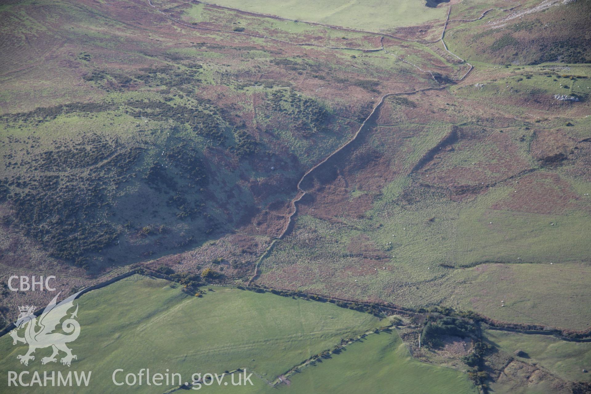 RCAHMW colour oblique aerial photograph of Enclosure Complex I at Ciliau-Uchaf from the east. Taken on 09 February 2006 by Toby Driver.