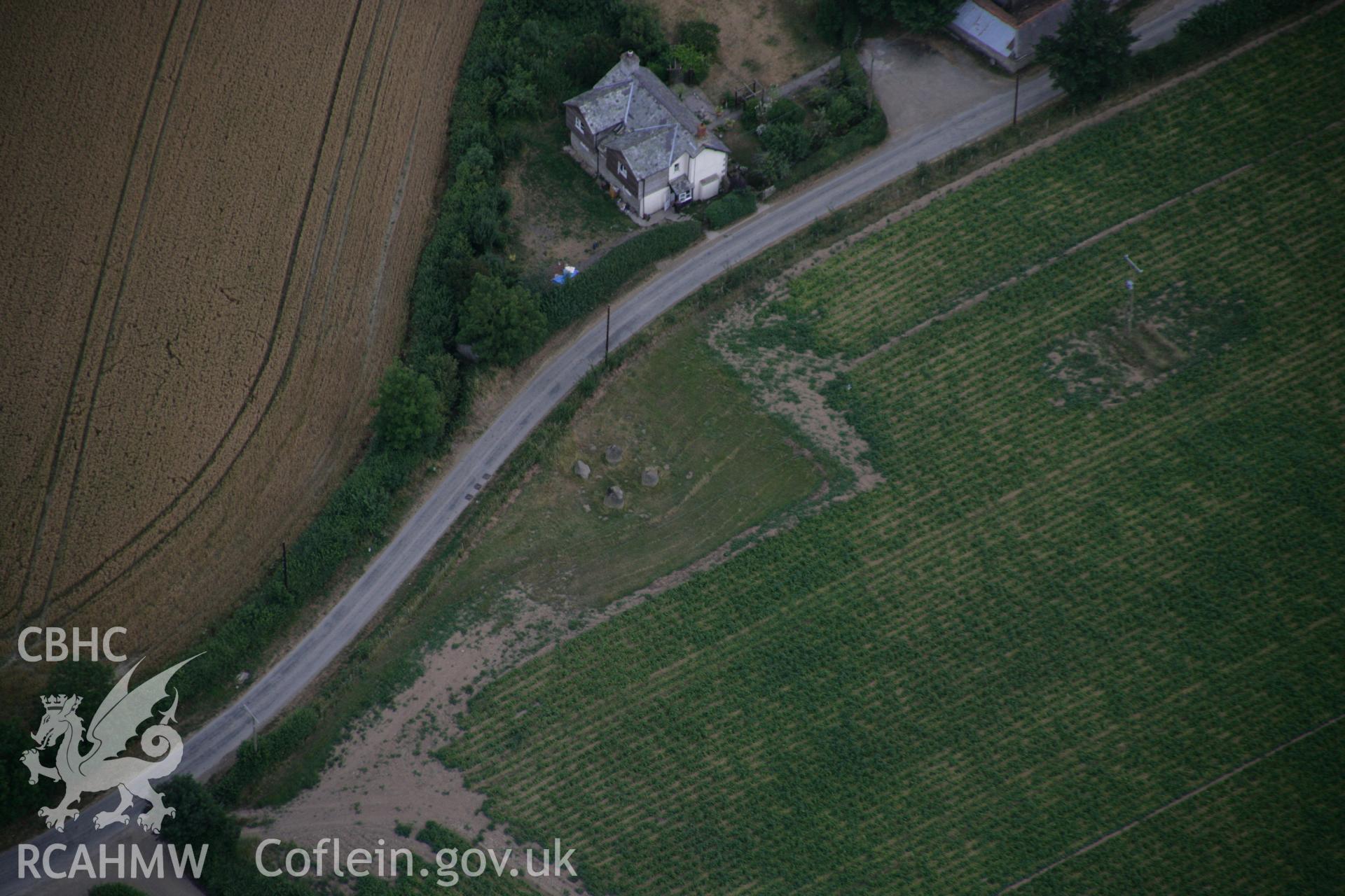 RCAHMW colour oblique aerial photograph of Four Stones. Taken on 27 July 2006 by Toby Driver.