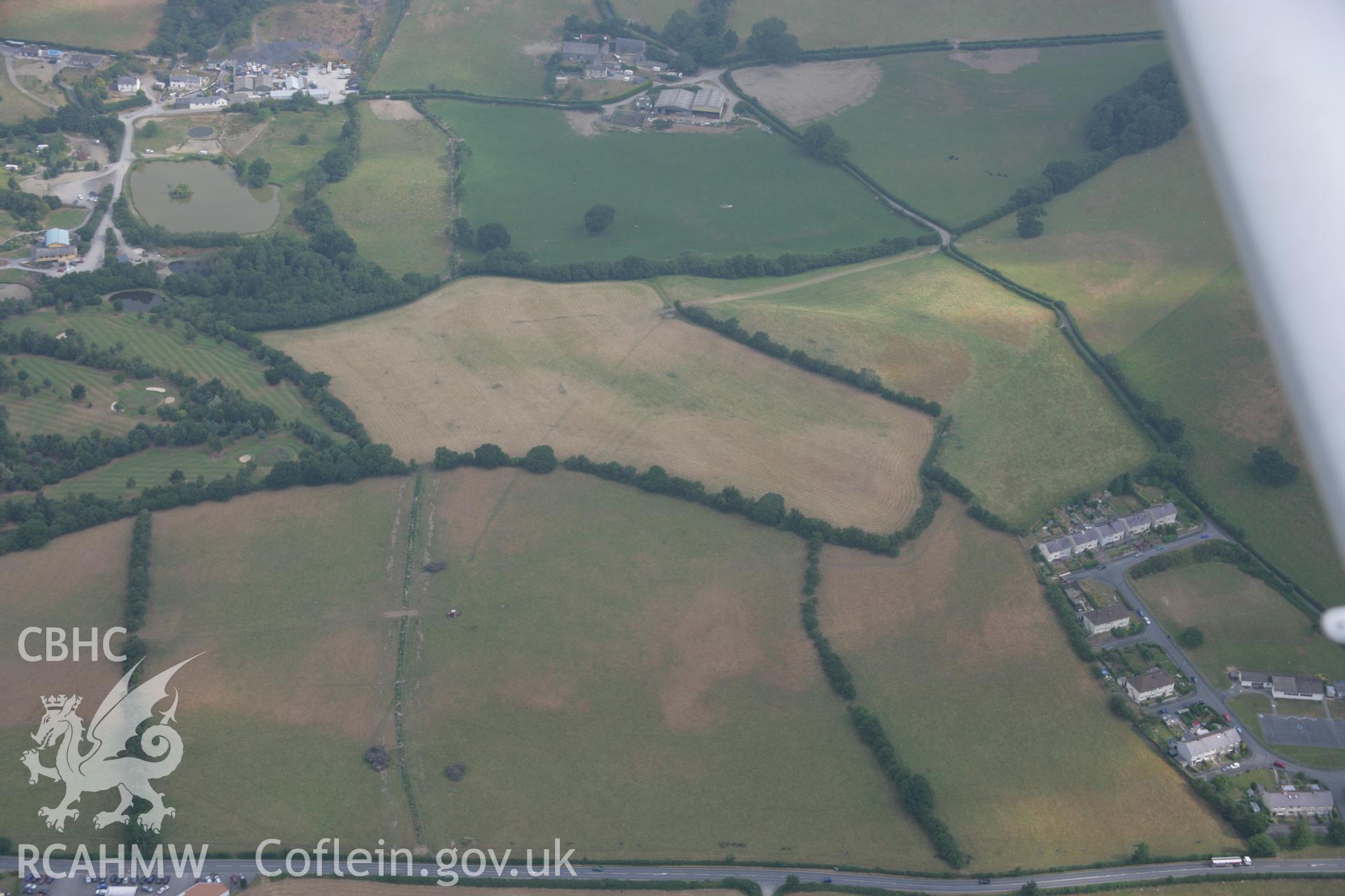 RCAHMW colour oblique aerial photograph of Pen-Llwyn Roman Fort. Taken on 21 July 2006 by Toby Driver.