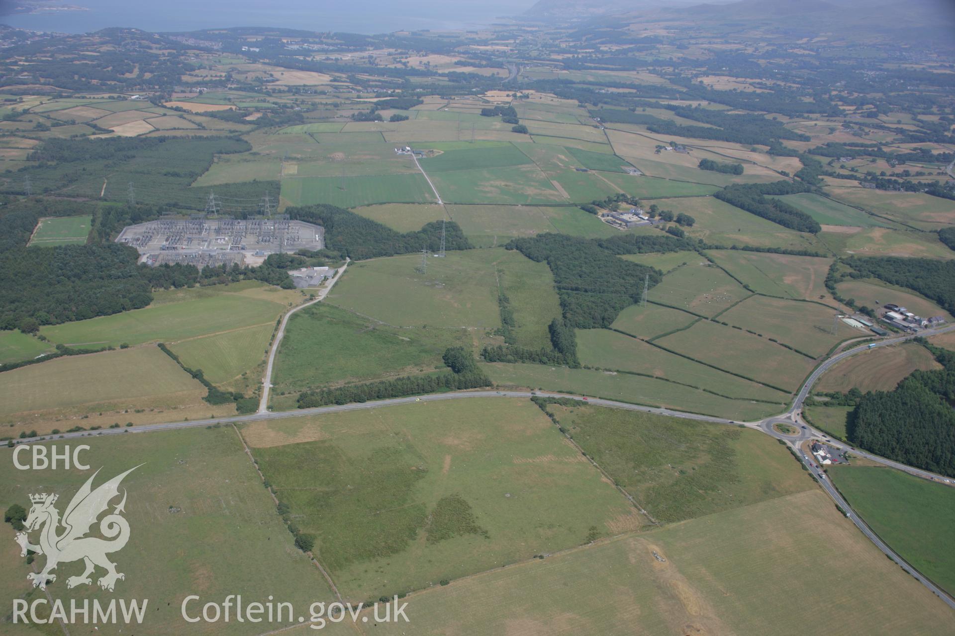 RCAHMW colour oblique aerial photograph of Roman road parchmarks Taken on 25 July 2006 by Toby Driver.