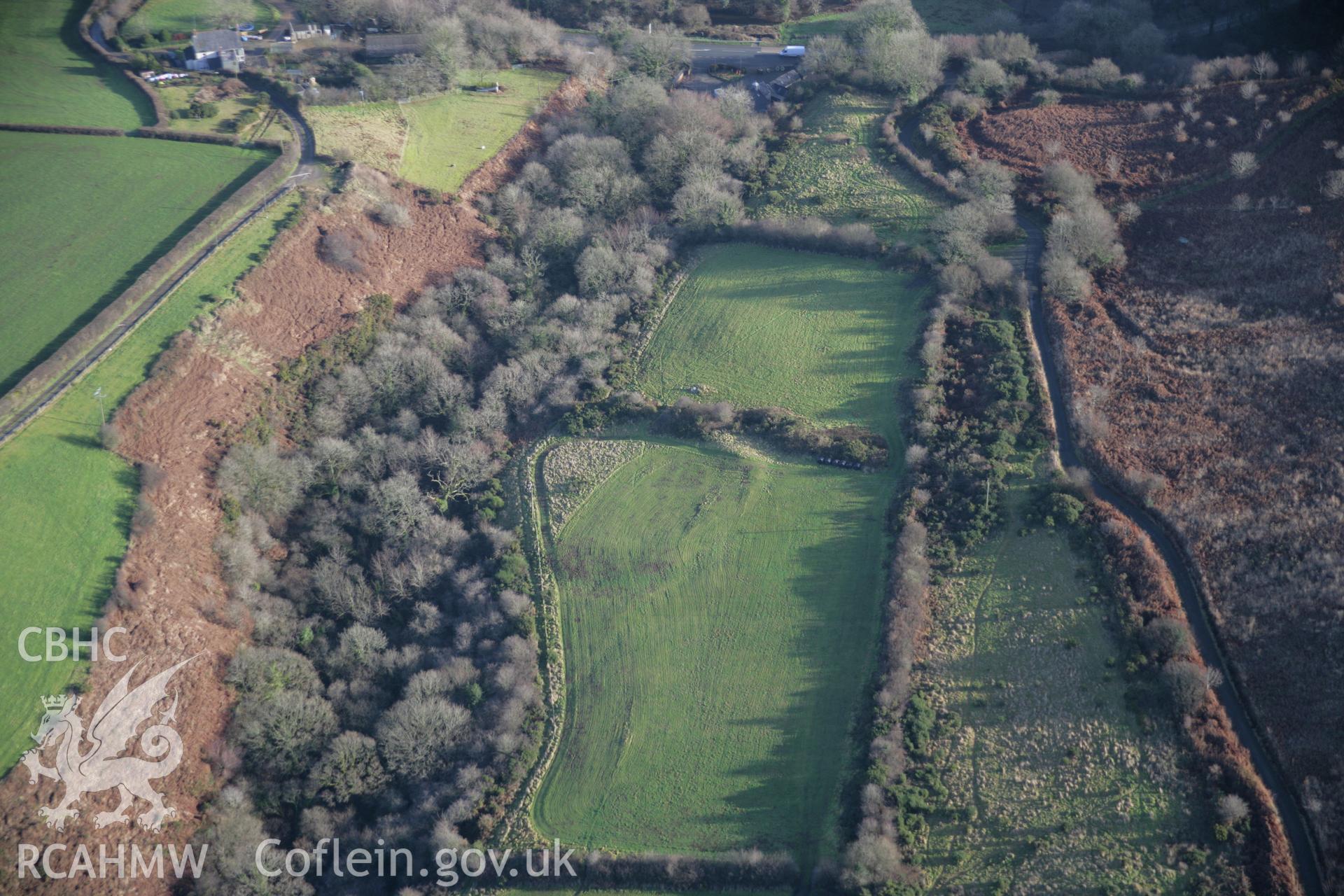 RCAHMW colour oblique aerial photograph of Nant-y-Coy Defeneded Enclosure viewed from the west. Taken on 11 January 2006 by Toby Driver.