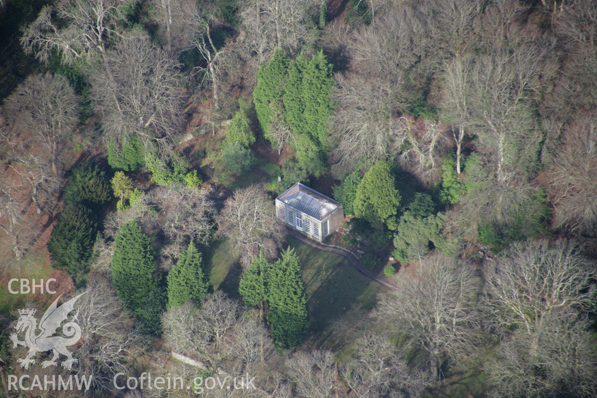 RCAHMW colour oblique aerial photograph of Penrice Castle Garden, showing summerhouse in woods, viewed from the south-east. Taken on 26 January 2006 by Toby Driver.