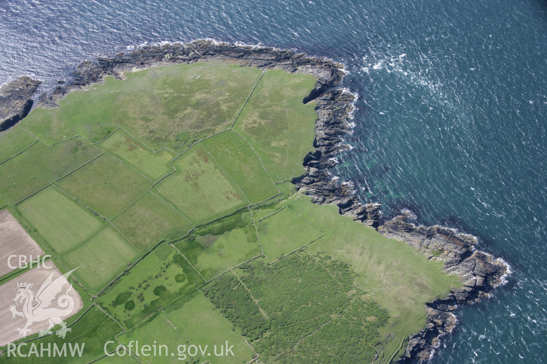 RCAHMW colour oblique aerial photograph of Field Systems, Bardsey Island. Taken on 14 June 2006 by Toby Driver