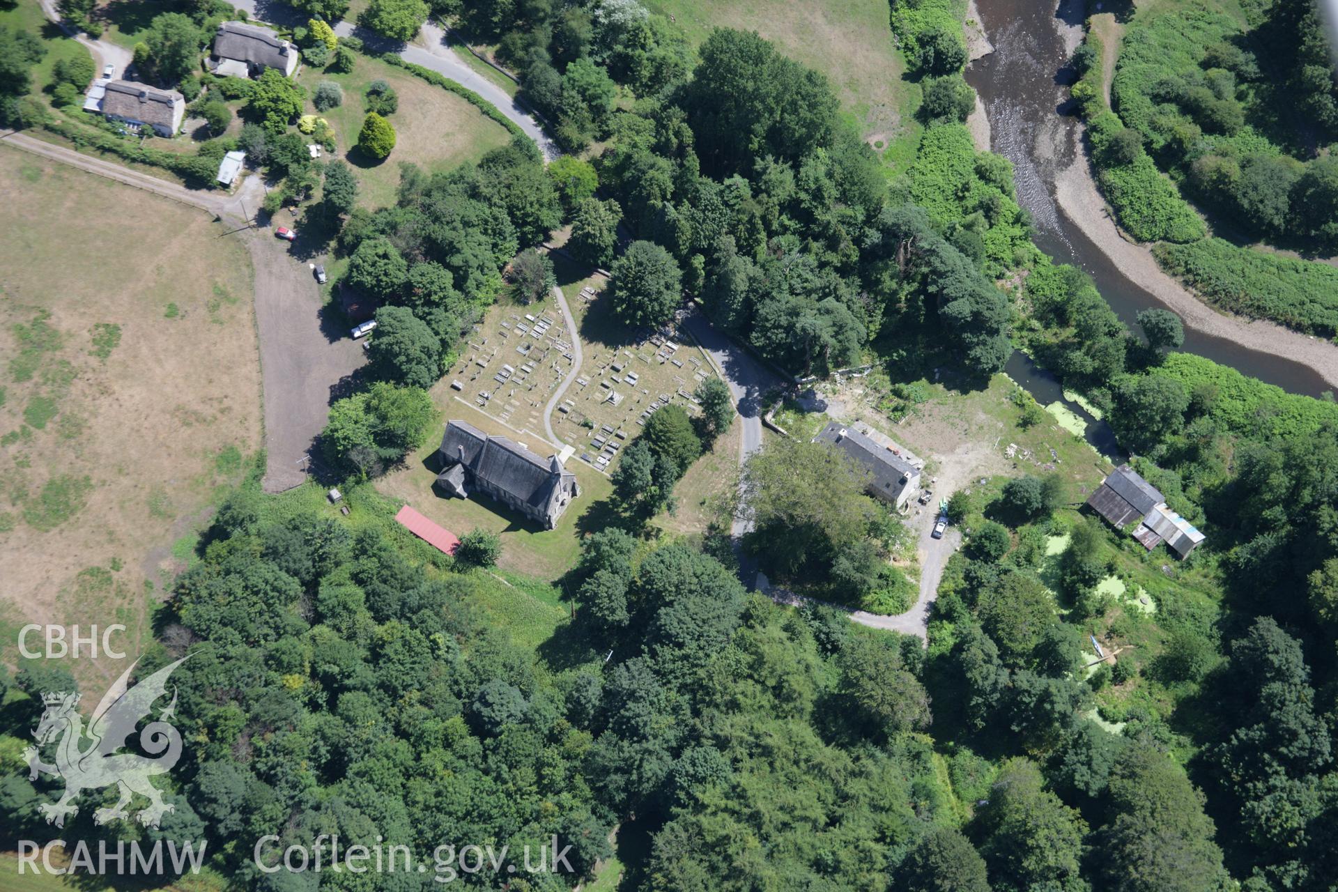 RCAHMW colour oblique aerial photograph of St Teilo's Church. Taken on 24 July 2006 by Toby Driver.