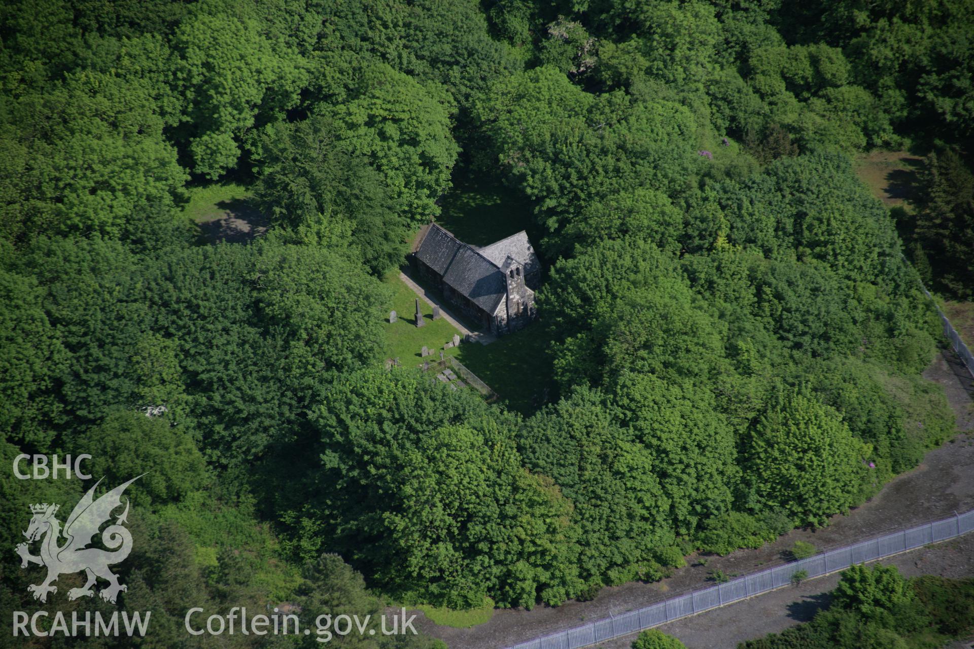 RCAHMW colour oblique aerial photograph of St David's Church, Llanychaer, from the north-west. Taken on 08 June 2006 by Toby Driver.