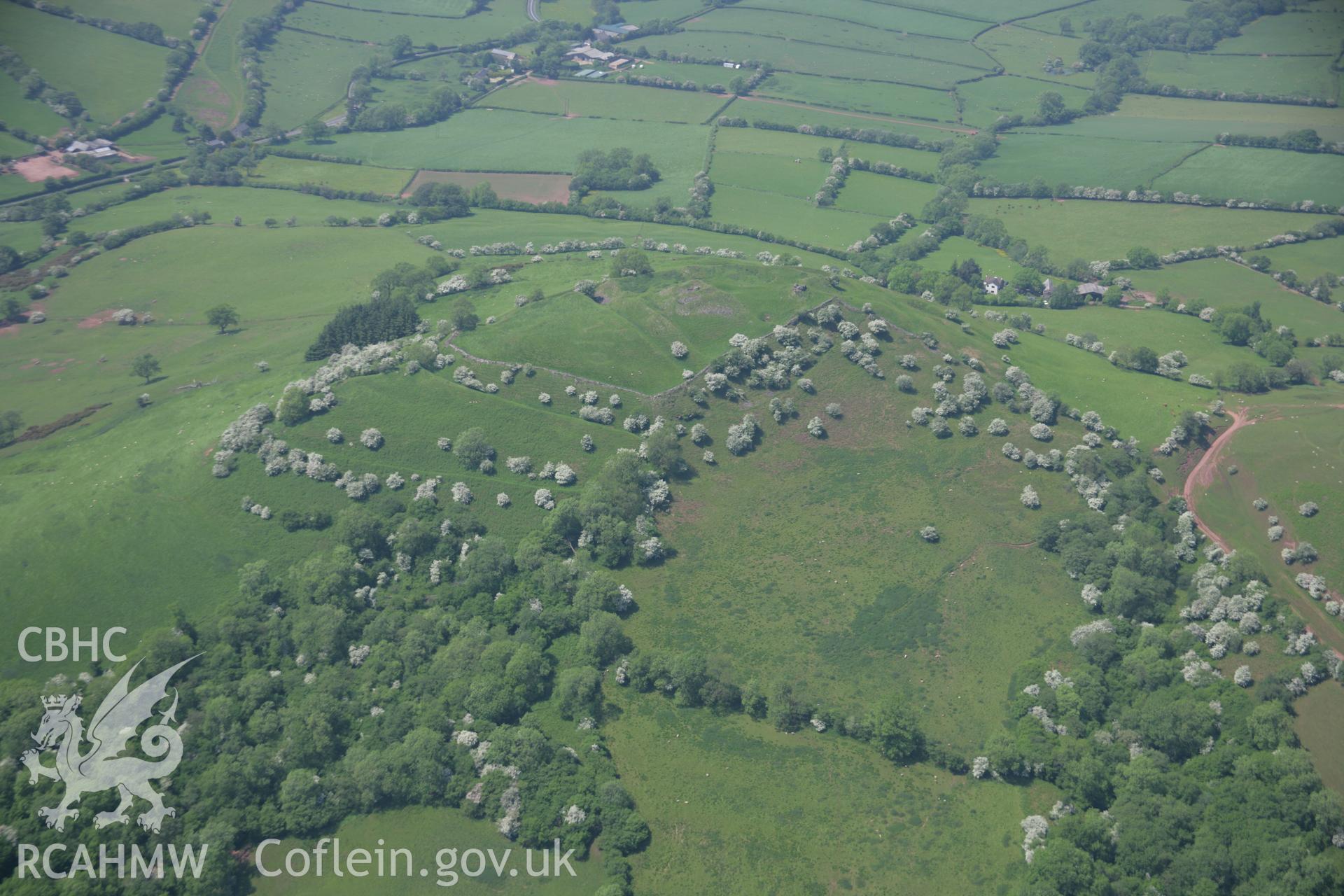 RCAHMW colour oblique aerial photograph of Castell Dinas from the south-east. Taken on 09 June 2006 by Toby Driver.