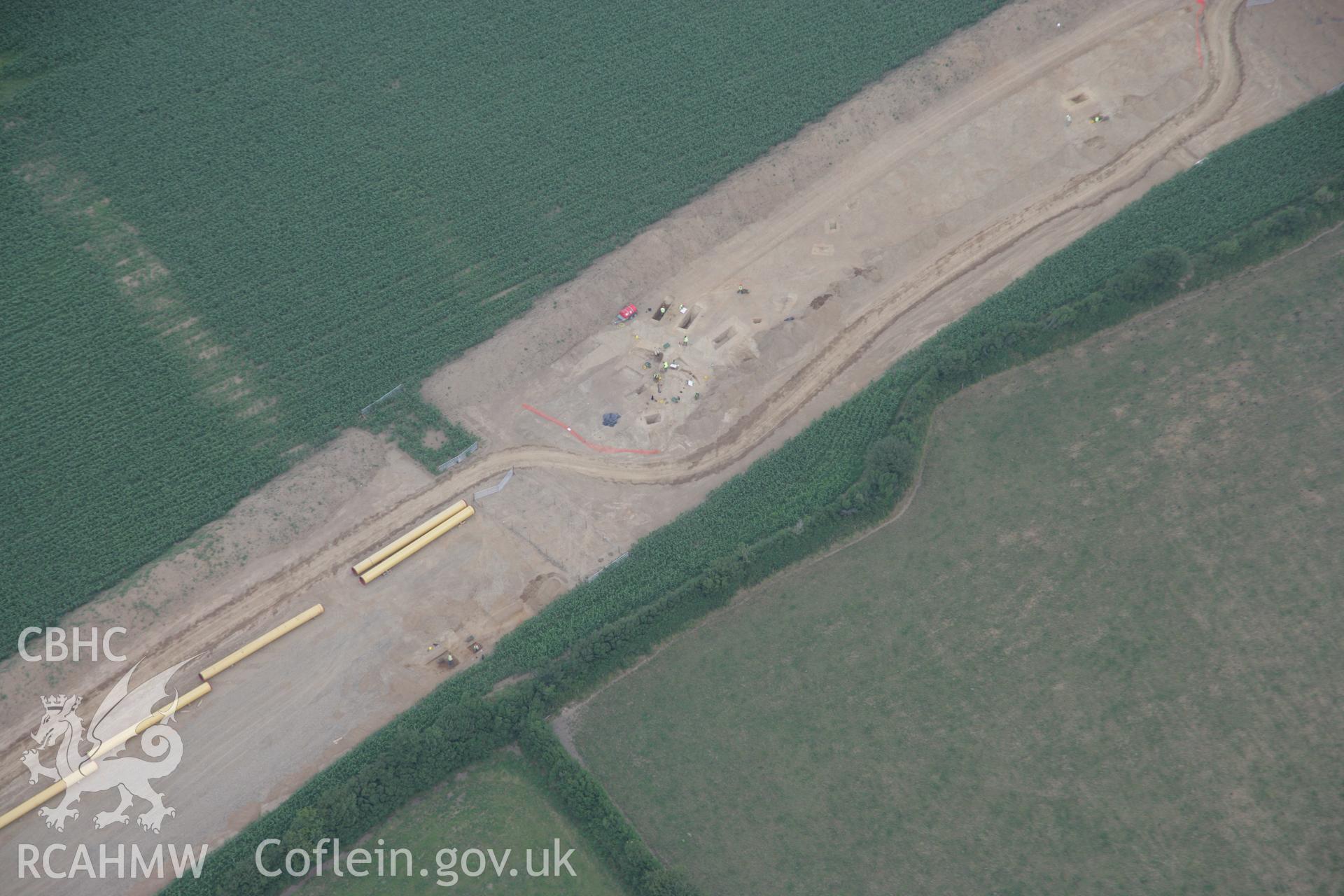 RCAHMW colour oblique aerial photograph of Wiston showing excavations on the route of the gas pipeline. Taken on 21 July 2006 by Toby Driver.