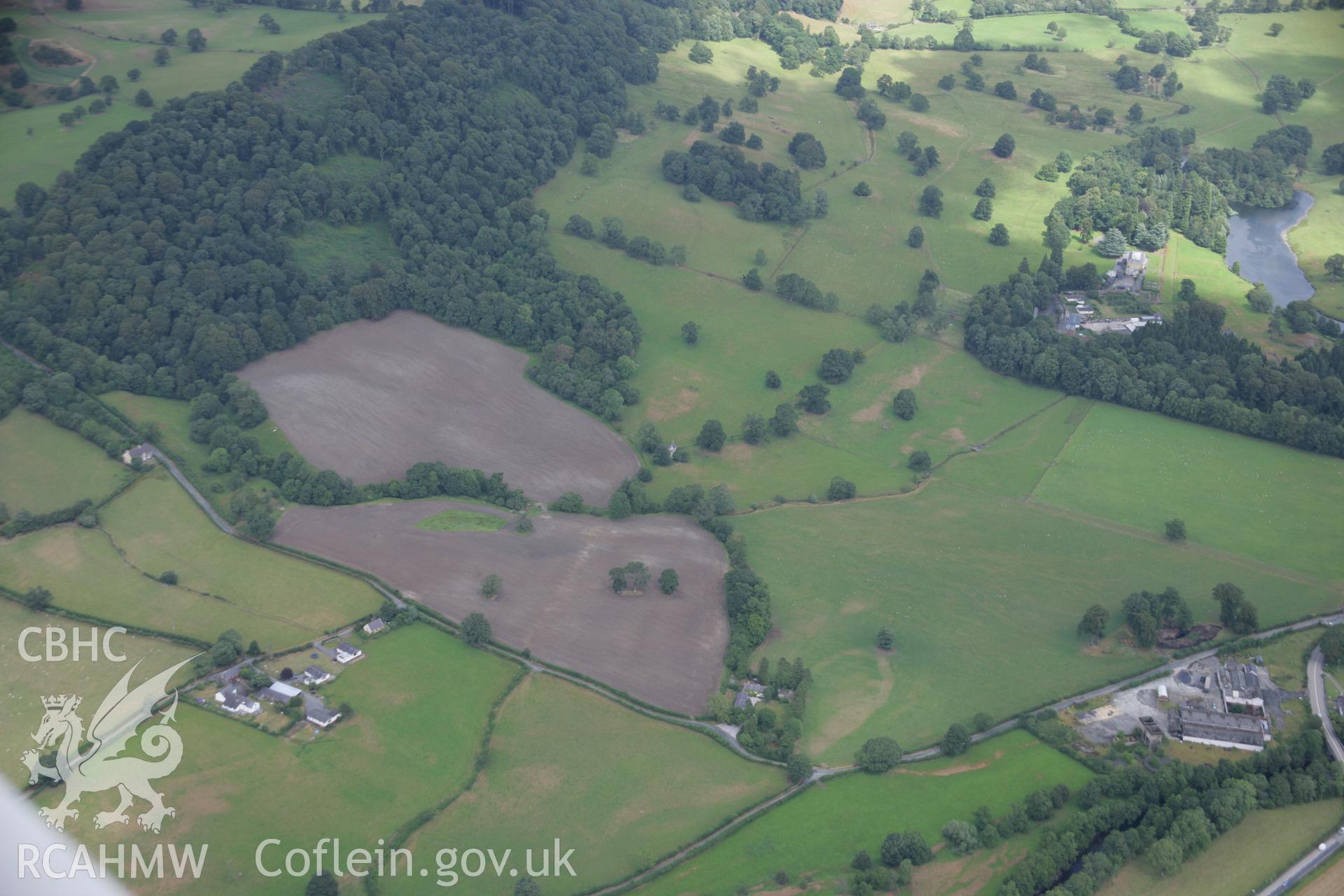 RCAHMW colour oblique aerial photograph of a section of Roman Road from Druid to Pen-y-Bont and Rug. Taken on 31 July 2006 by Toby Driver.