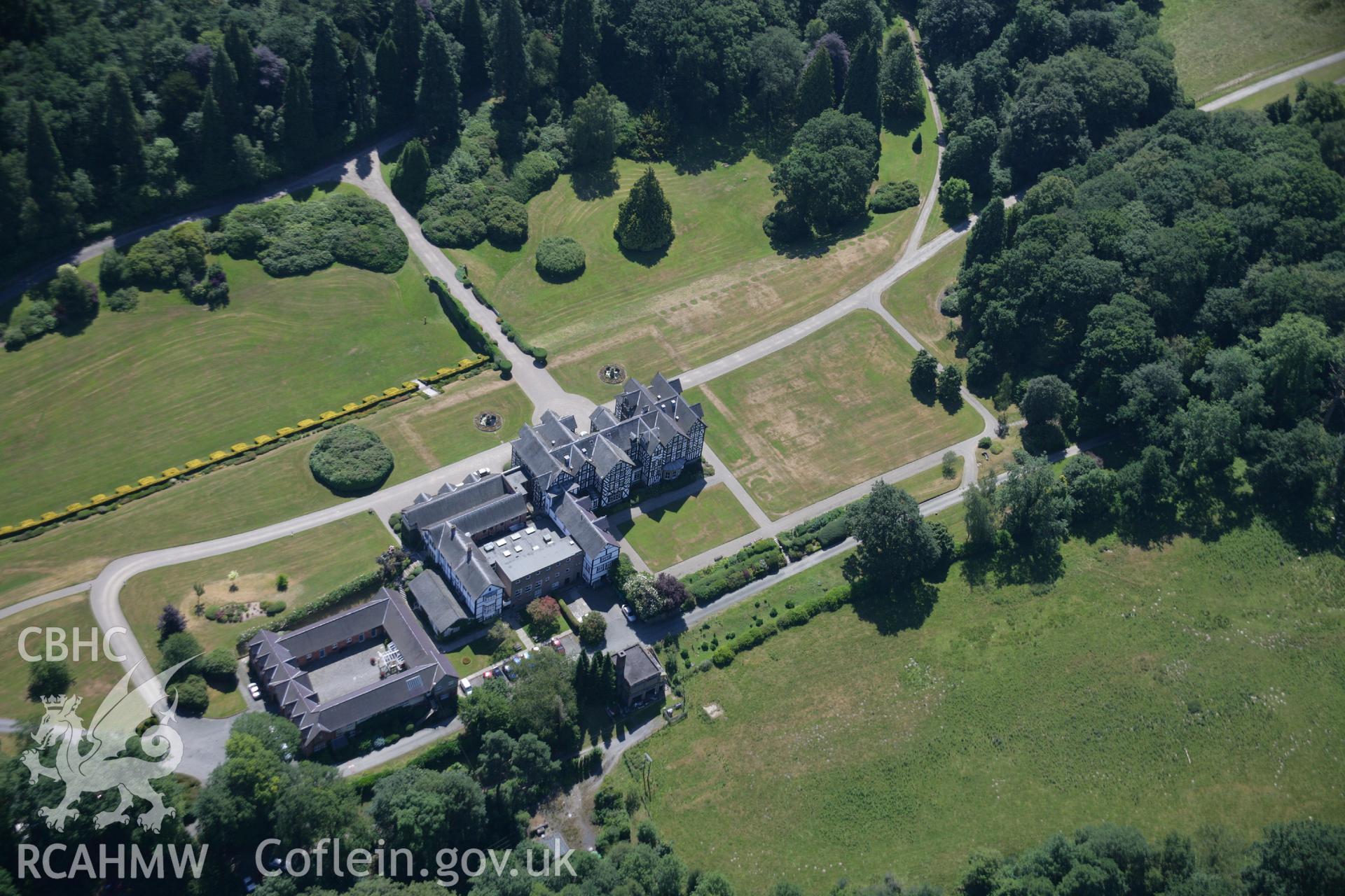 RCAHMW colour oblique aerial photograph of Gregynog Hall Garden, Tregynon, showing parchmarks. Taken on 17 July 2006 by Toby Driver.