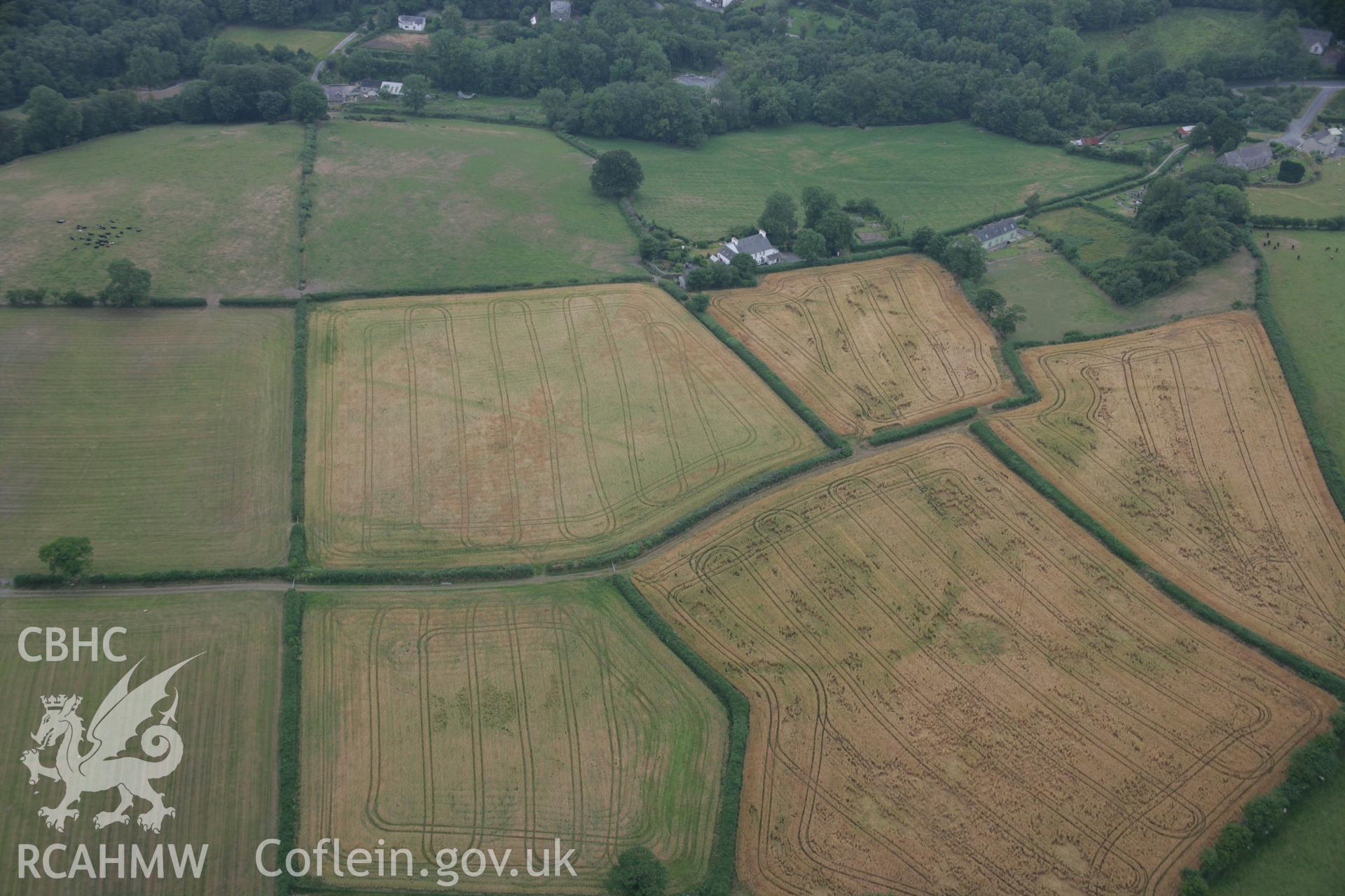 RCAHMW colour oblique aerial photograph of St Sulien's Church Enclosure. Taken on 21 July 2006 by Toby Driver.