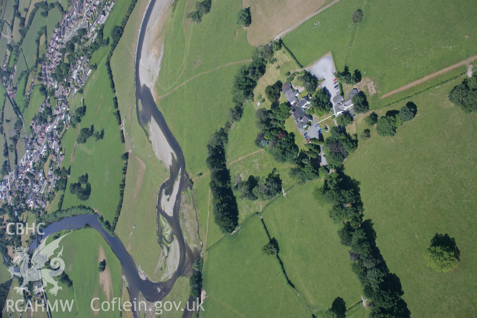 RCAHMW colour oblique aerial photograph of Roman road parchmarks, Maesmawr Hall. Taken on 17 July 2006 by Toby Driver.