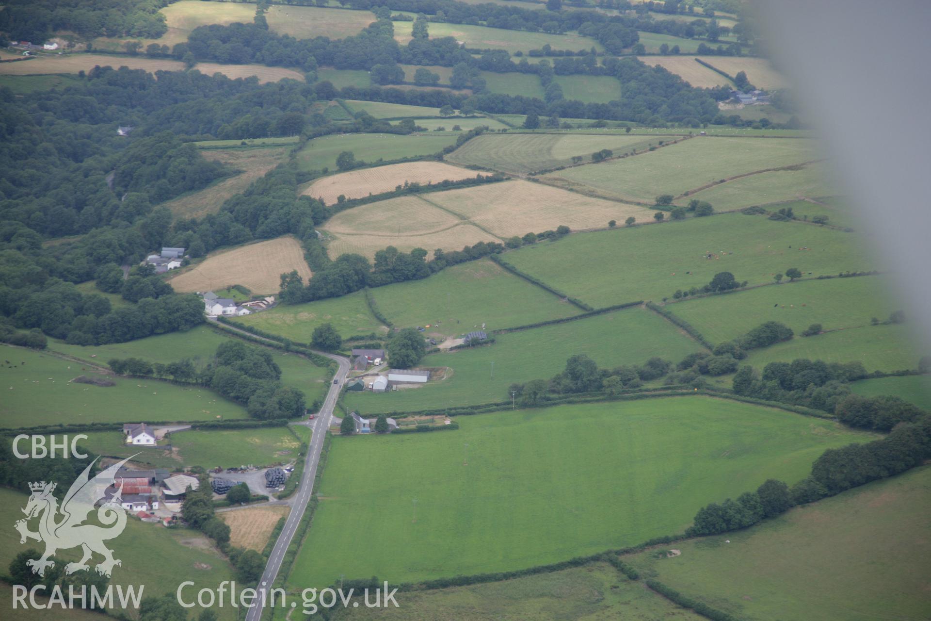 RCAHMW colour oblique aerial photograph of Llech Ciste, Llanegwad. Taken on 27 July 2006 by Toby Driver.