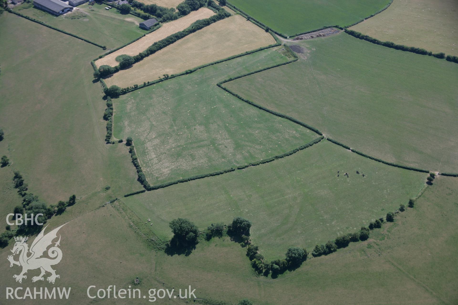 RCAHMW colour oblique aerial photograph of the causewayed enclosure at Flemingston. Taken on 24 July 2006 by Toby Driver.