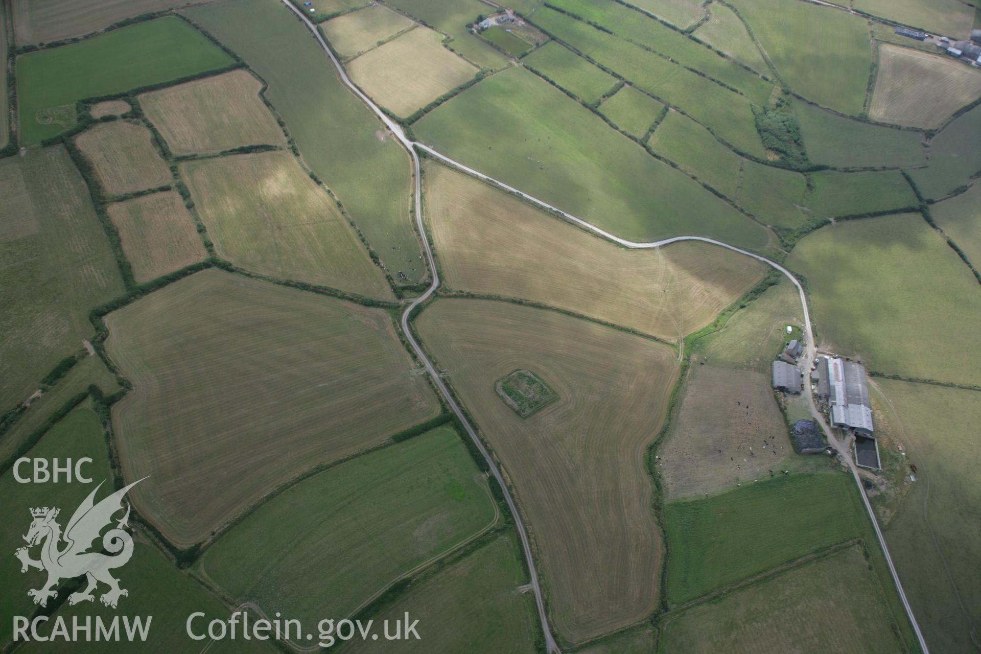 RCAHMW colour oblique aerial photograph of St Merins Church, from the north-west. Taken on 03 August 2006 by Toby Driver.