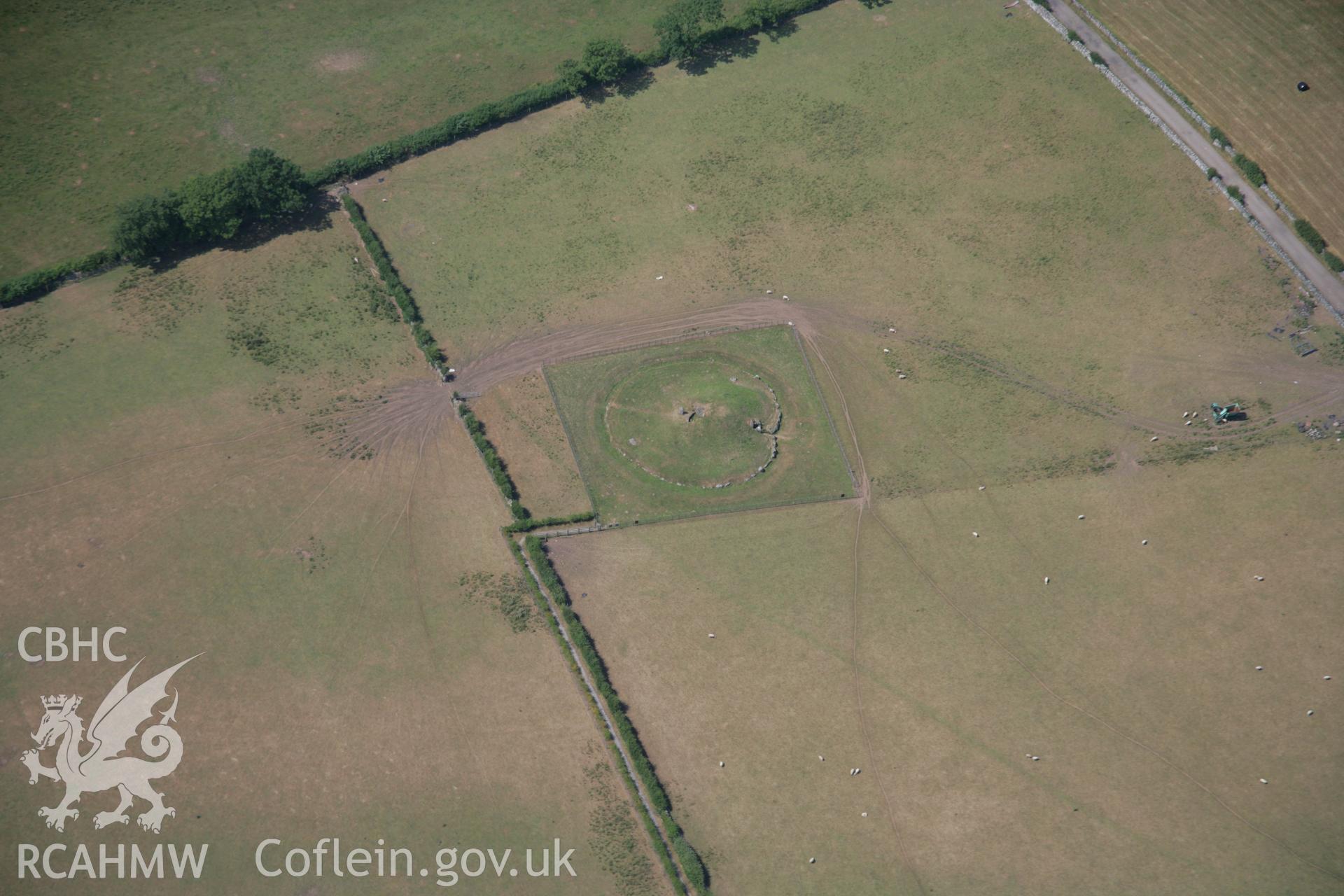 RCAHMW colour oblique aerial photograph of Bryn Celli Ddu Chambered Tomb. Taken on 25 July 2006 by Toby Driver.