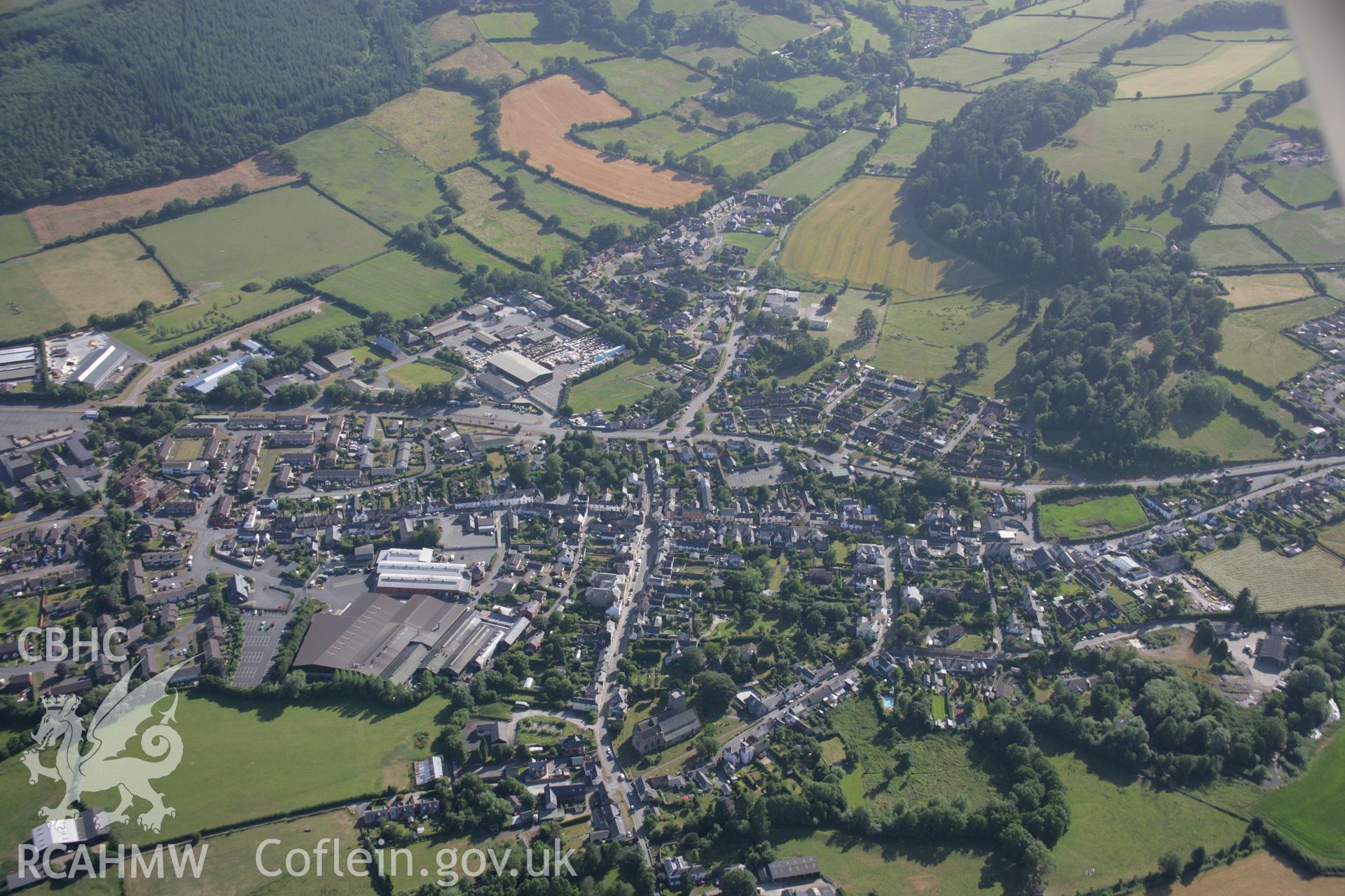 RCAHMW colour oblique aerial photograph of Presteigne Castle. Taken on 13 July 2006 by Toby Driver.