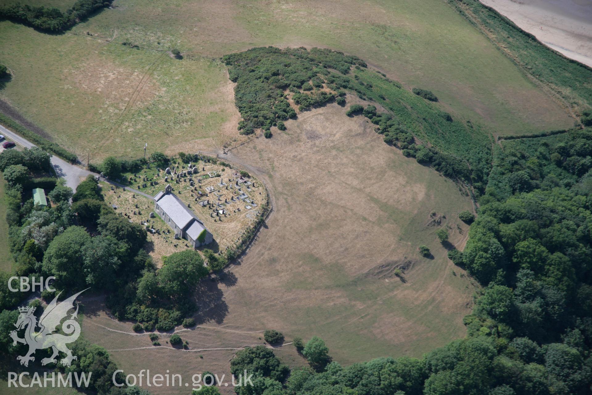 RCAHMW colour oblique aerial photograph of St Michael's Church, Llanfihangel Penbryn. Taken on 27 July 2006 by Toby Driver.