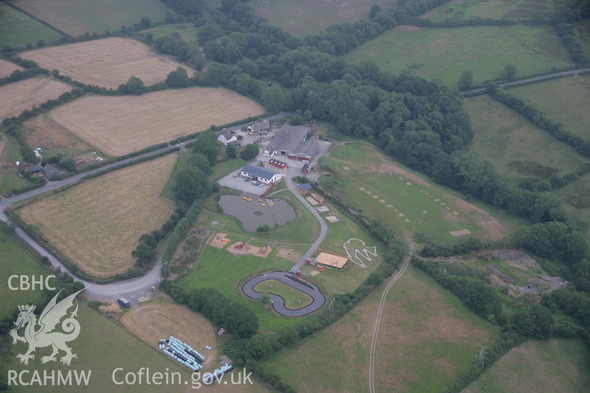 RCAHMW colour oblique aerial photograph of Llanrhystyd, Fantasy Farm Park Taken on 21 July 2006 by Toby Driver.