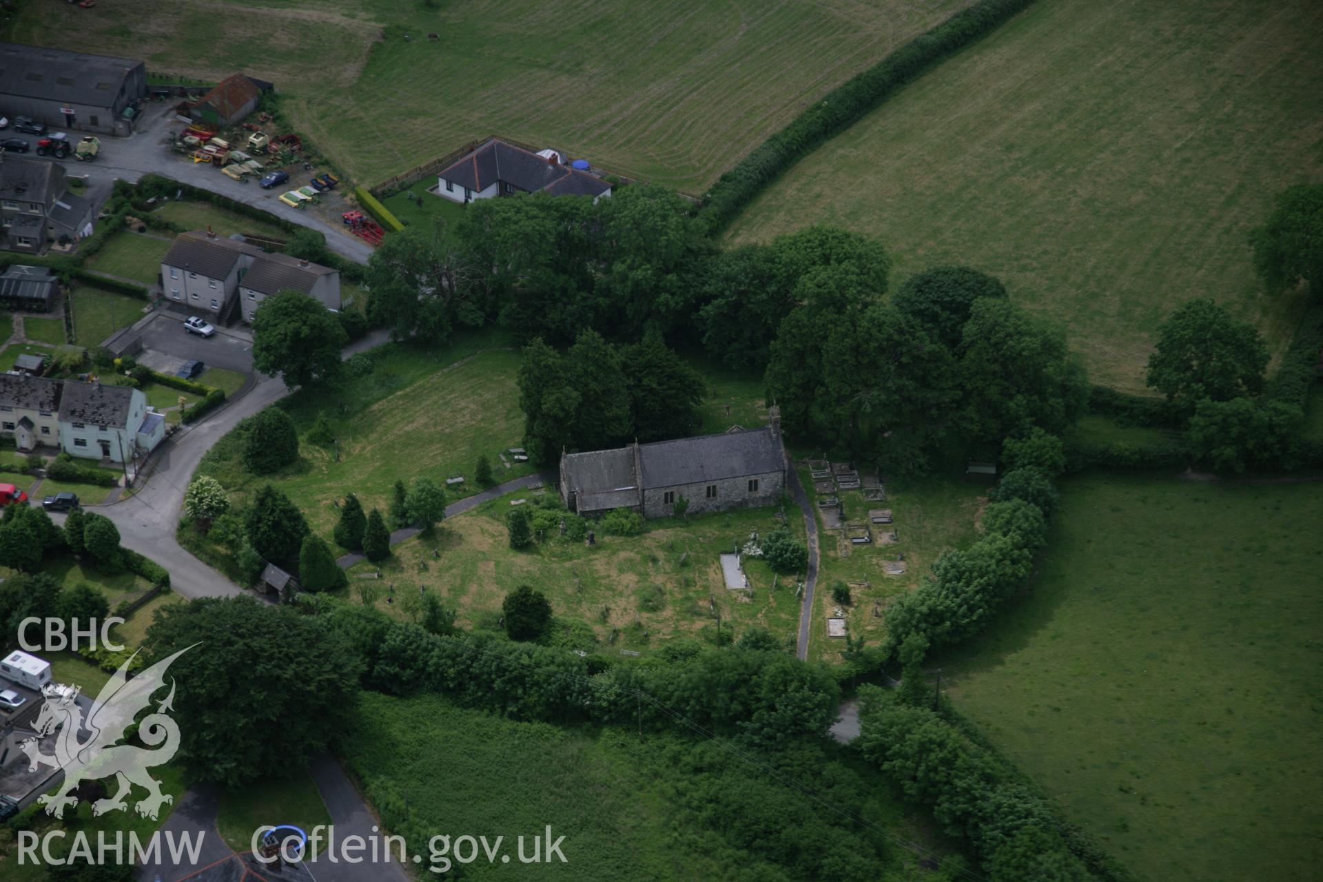 RCAHMW colour oblique aerial photograph of St Tysilio's Church, Llandissilio, viewed from the north-east. Taken on 15 June 2006 by Toby Driver